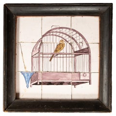 Delfter Tafel aus neun Steingutfliesen des 18. Jahrhunderts mit einem Vogel in einem Vogelkäfig