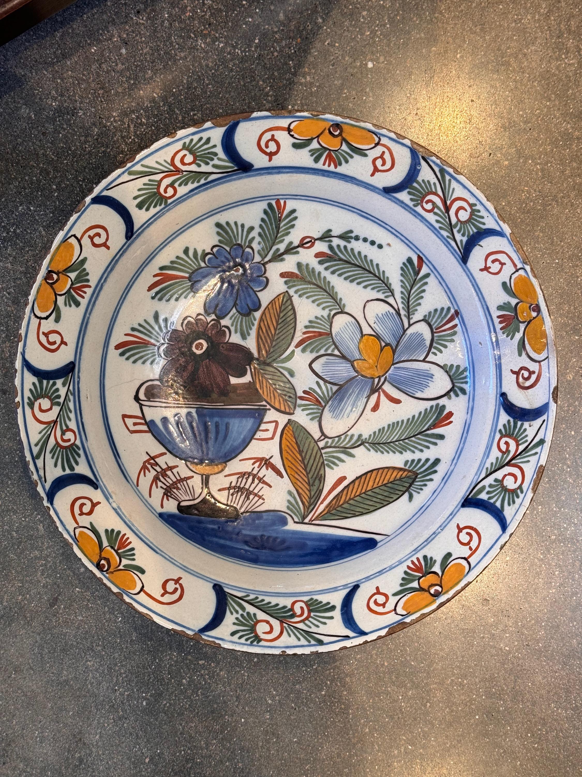 A great Polychrome Delft Charger. Nice decoration.