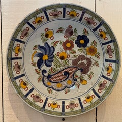 18th Century Delft Polychrome Charger With Floral and Scroll Motif