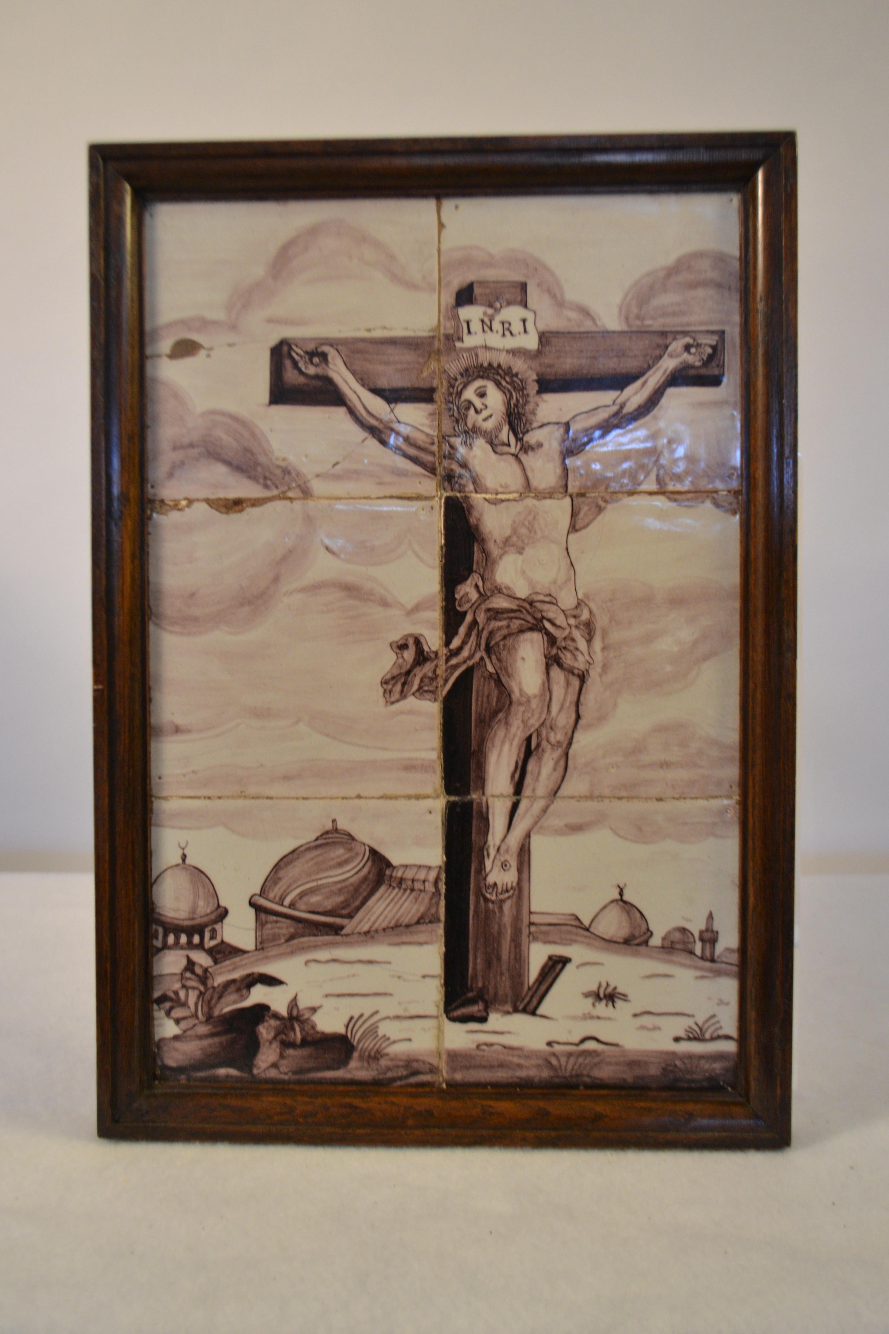 Delft tile wall picture of Christ on the cross with the letters I.N.R.I above his head (