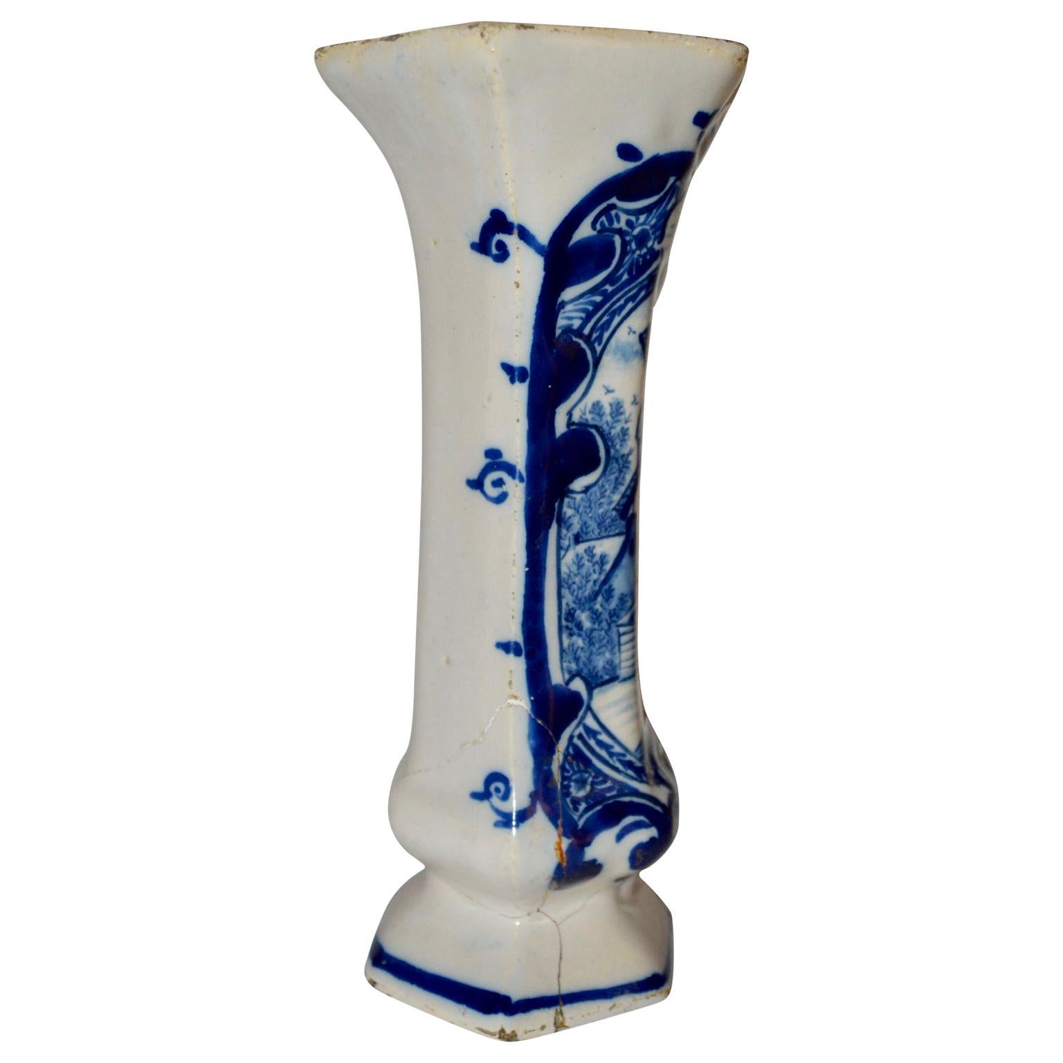 Late 18th century blue and white Dutch delft vase is painted with a traditional design in cobalt blue.
