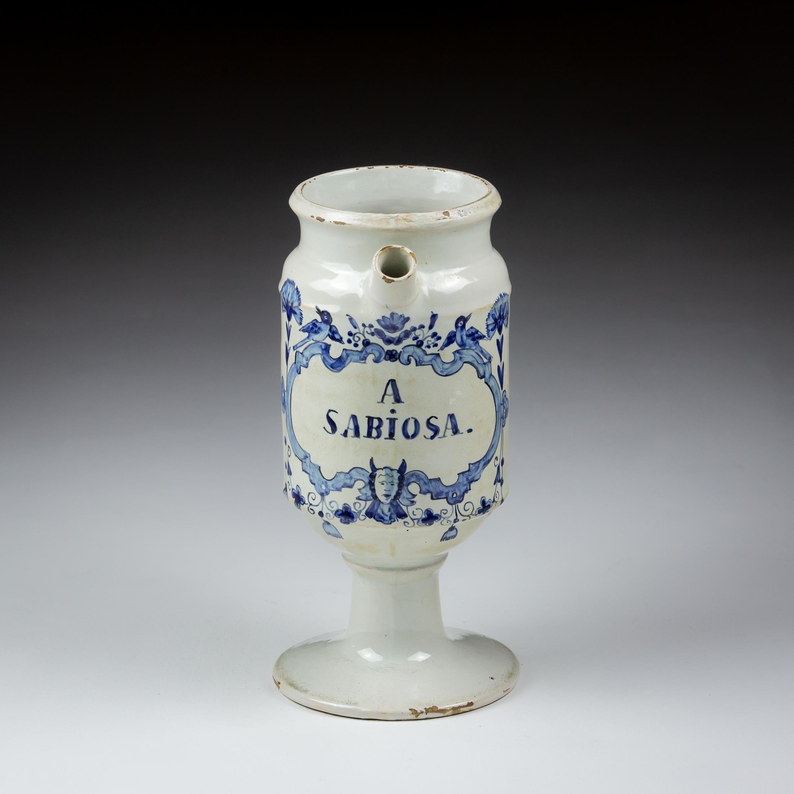 18th Century Wet Drug Jar, with spout and handle in remarkable condition. Named A Sabiosa. Dutch, Circa 1780.