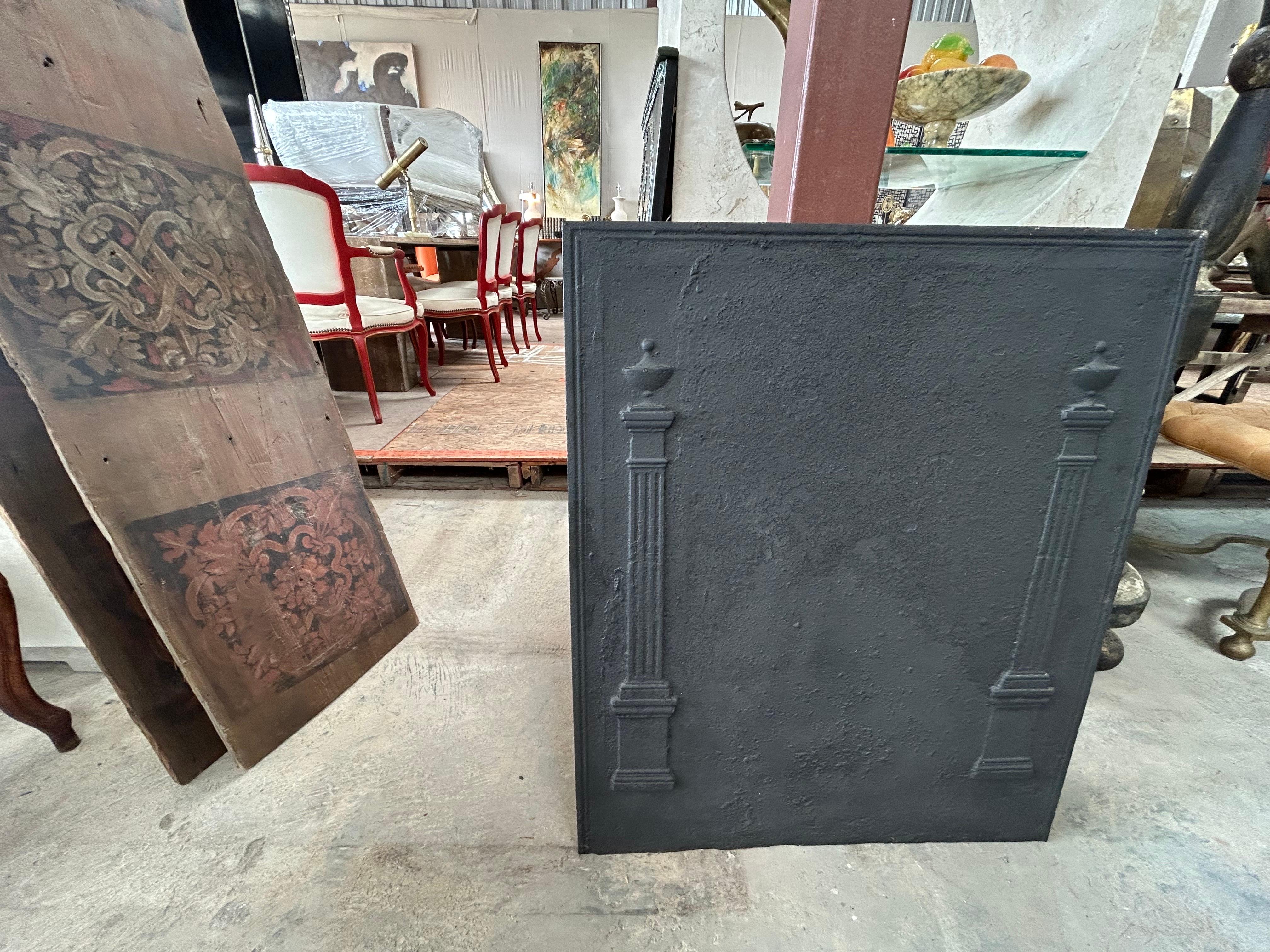 18th Century Directorie Cast Iron Fireback.
Handsome 18th century French Directoire cast iron fireback or fireplace back or fireplace screen with two columns.
Can be used in the back of a fire place, in a rustic kitchen as a backsplash, mounted