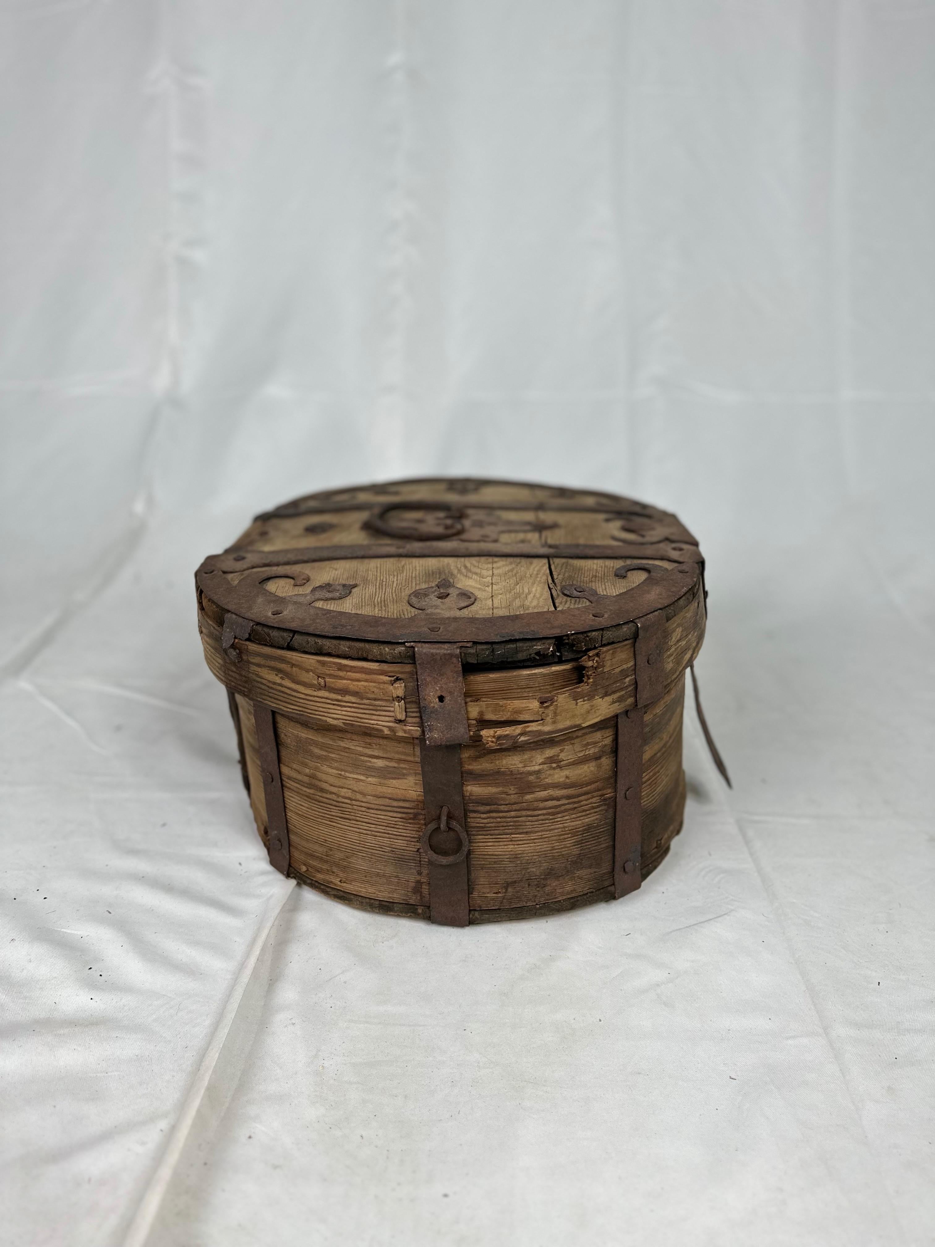 This late 18th-century Swedish wooden box is a captivating piece that effortlessly transports us to a bygone era. Crafted in Sweden during the final decade of the 18th century, it exudes a timeless charm that comes from its rustic aesthetics and the