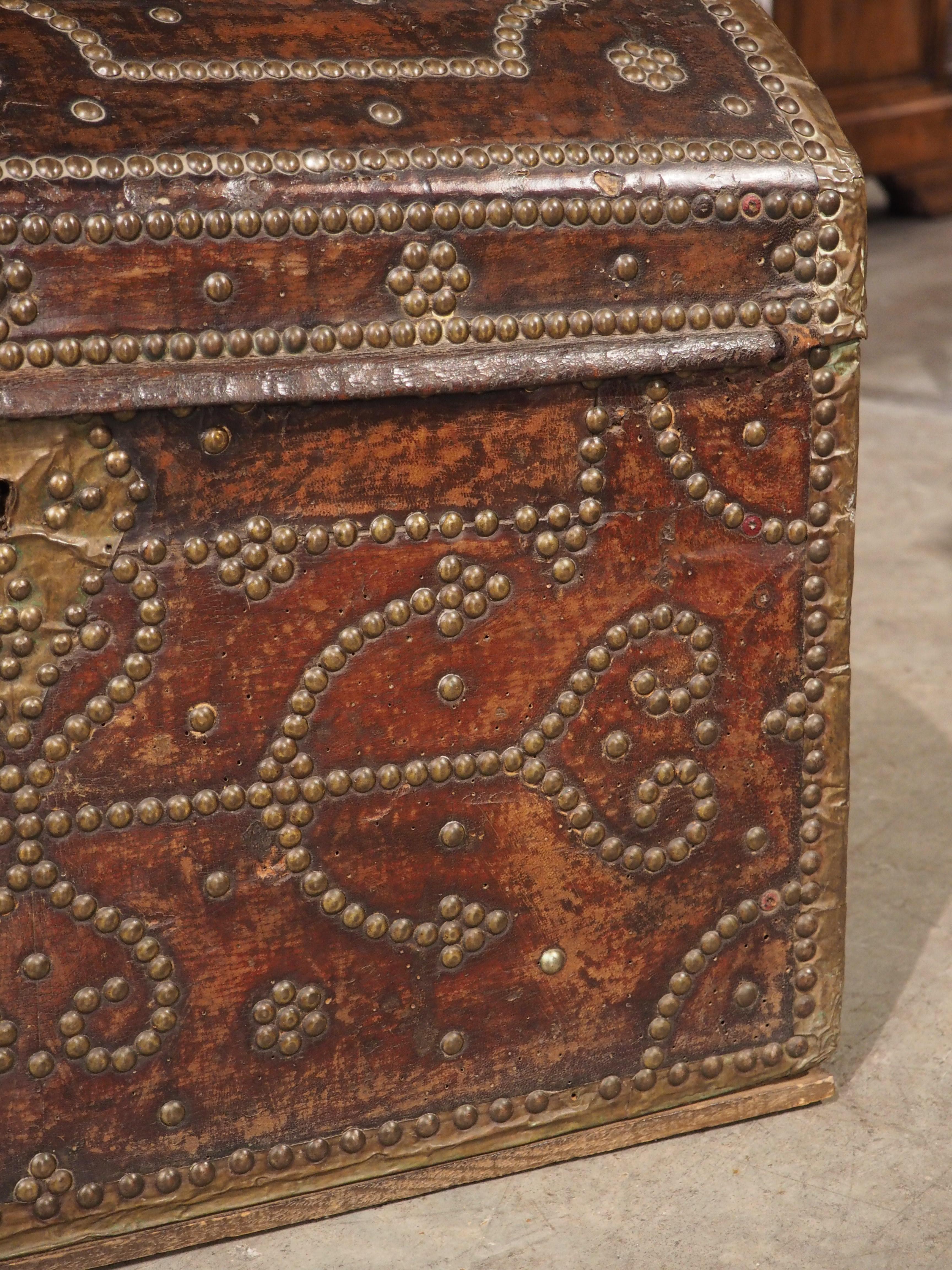 French 18th Century Domed and Studded Leather, Brass, and Wood Trunk from France For Sale