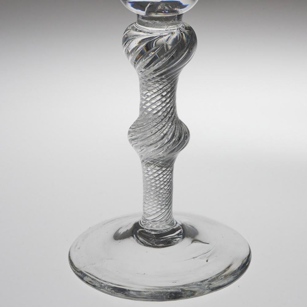 18th century Double Knop Air Twist Wine Glass, circa 1750

Additional Information:
Period: George II - c1750
Origin: England
Colour: Clear
Bowl: Round funnel
Stem: Short plain section - multi spiral air twist with inverted baluster knop and