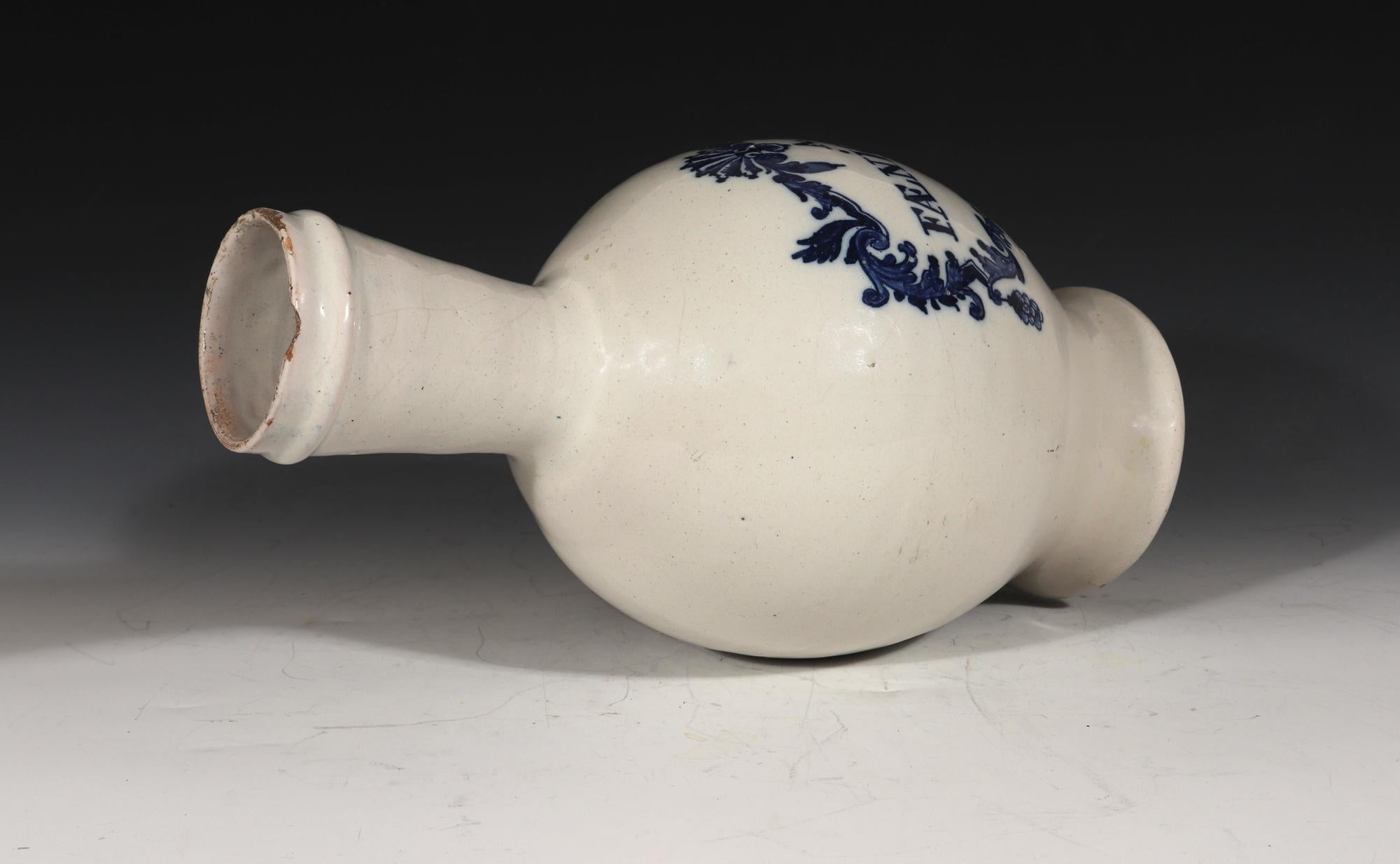 Dutch Delft bottle-shaped wet drug Jar,
Inscribed 'A. FAENICVLI',
Circa 1710-50

The underglaze blue Dutch Delft jar is of a bottle-form. It has an inscription on the front reading 'A. FAENICVLI' within an underglaze blue surround comprised of a