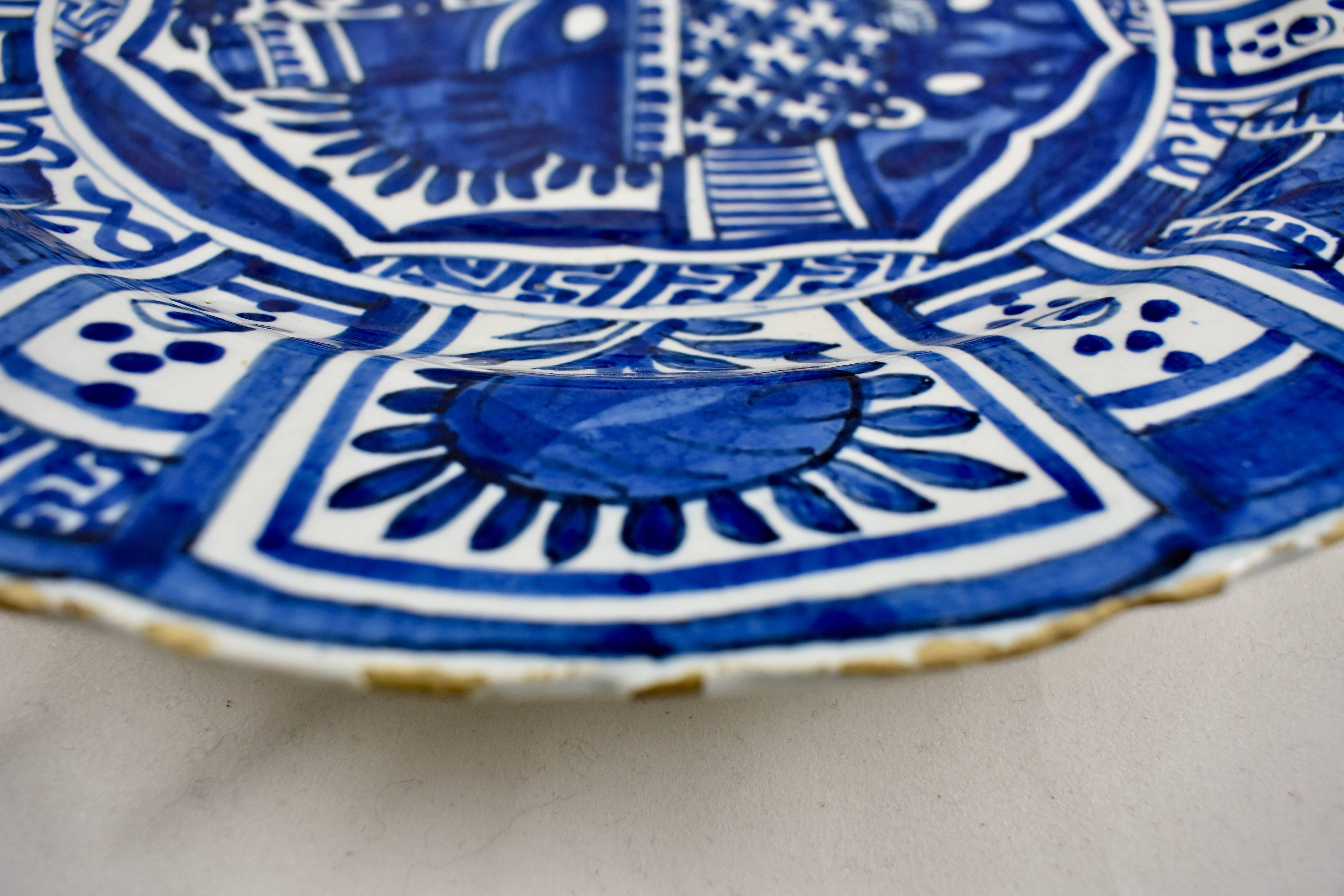 Glazed 18th Century Dutch Delft Faïence Daisy Floral and Geometric Cobalt Blue Charger For Sale