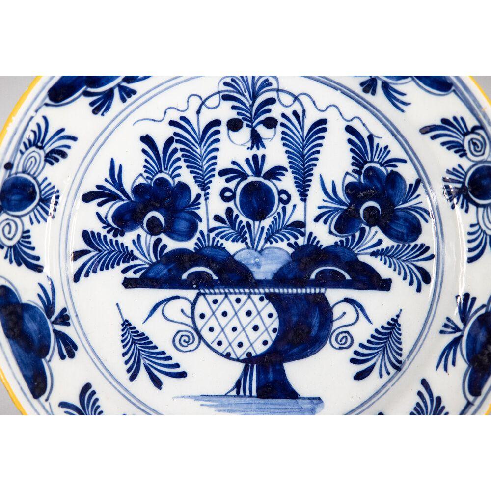 A gorgeous antique 18th-Century Dutch Delft faience floral charger. This lovely large 13.5