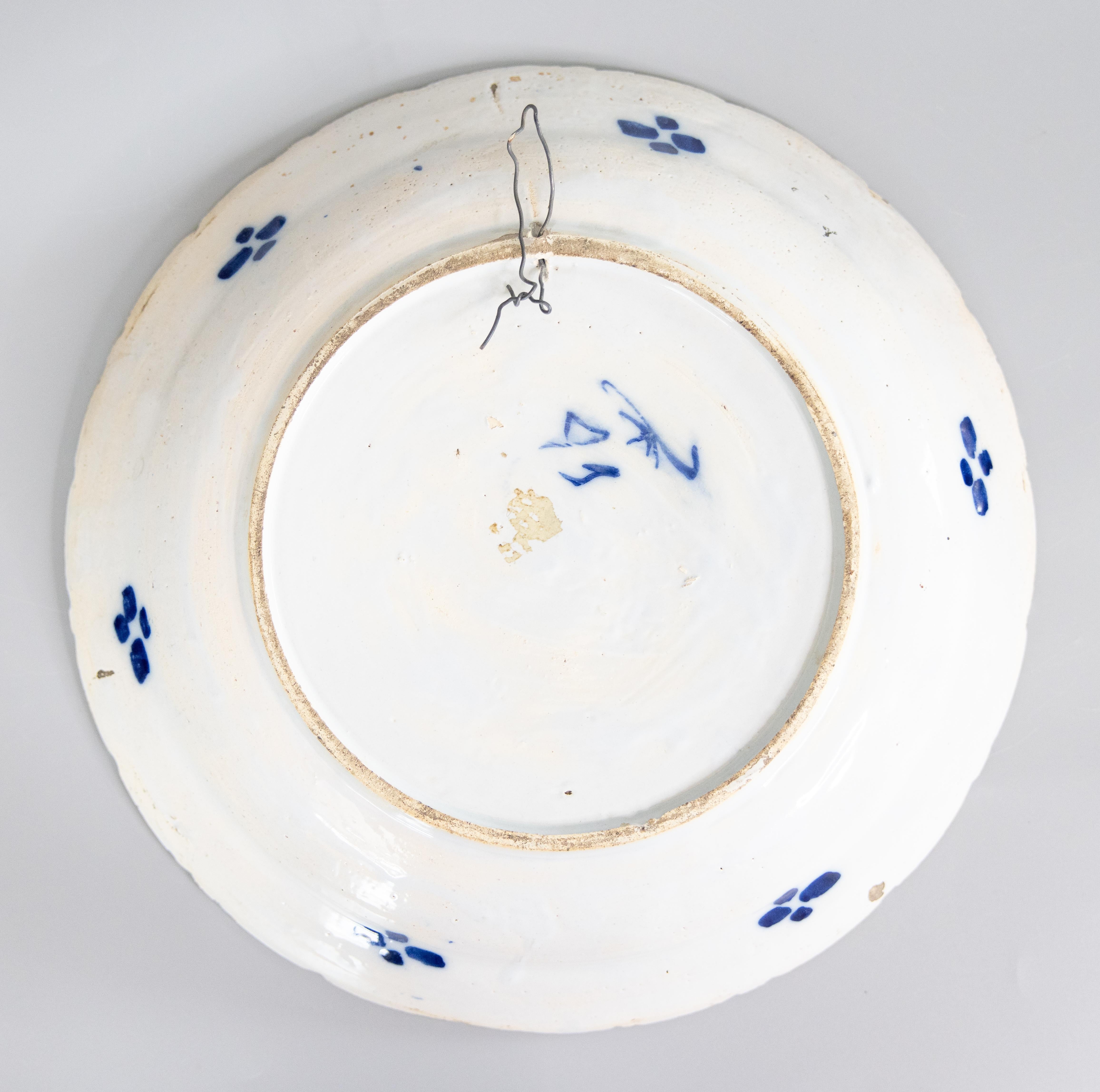 Cargador festoneado de pájaro pavo real de loza holandesa del siglo XVIII siglo XVIII y antes en venta
