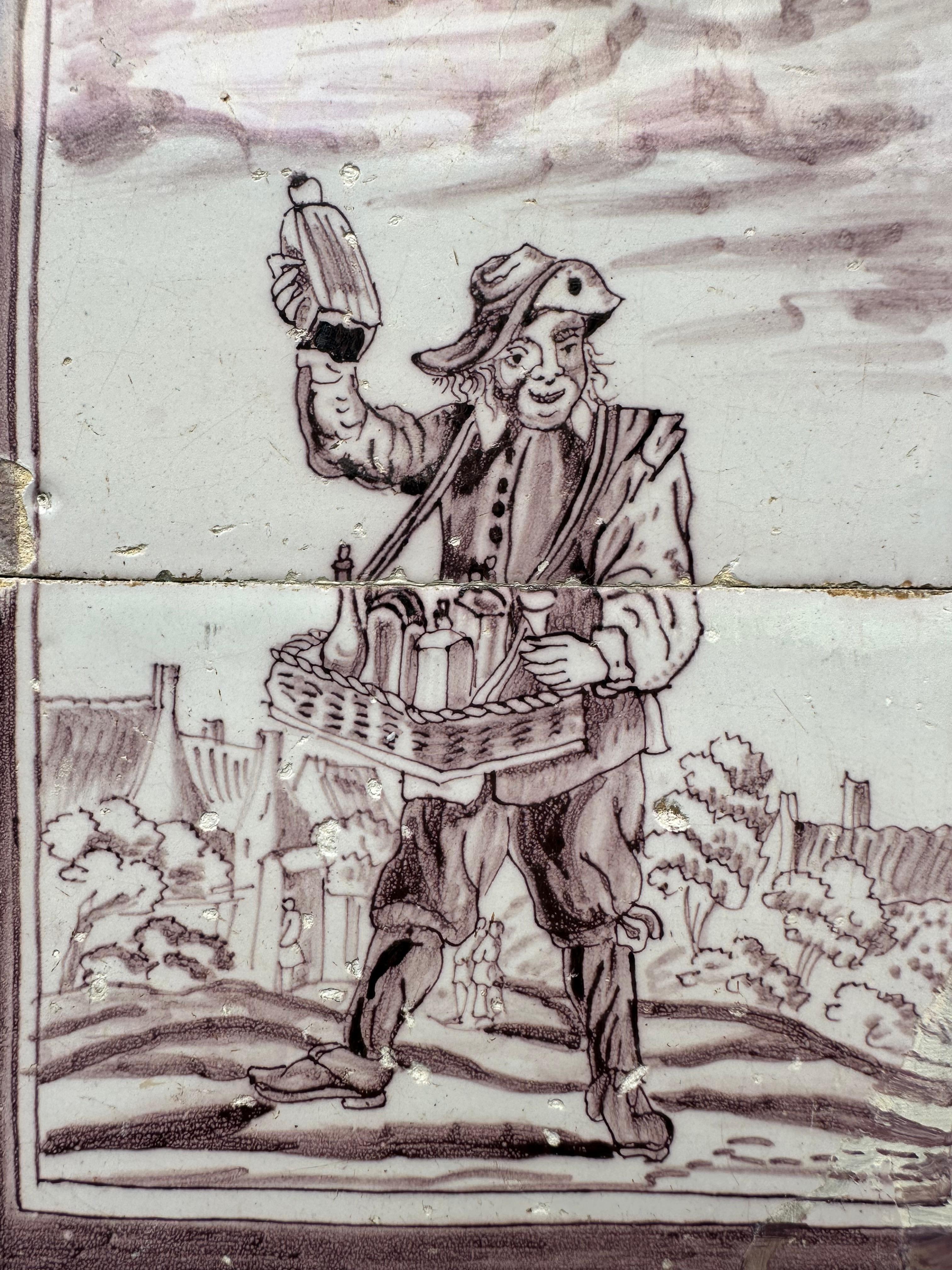 The Netherlands
Rotterdam
Circa 1725 – 1775

A manganese tile panel of two tiles, probably the base of a pillar, with the decoration of a liquor seller, and by the look on his face he had quite the taste of his merchandise! Beautiful detail in the