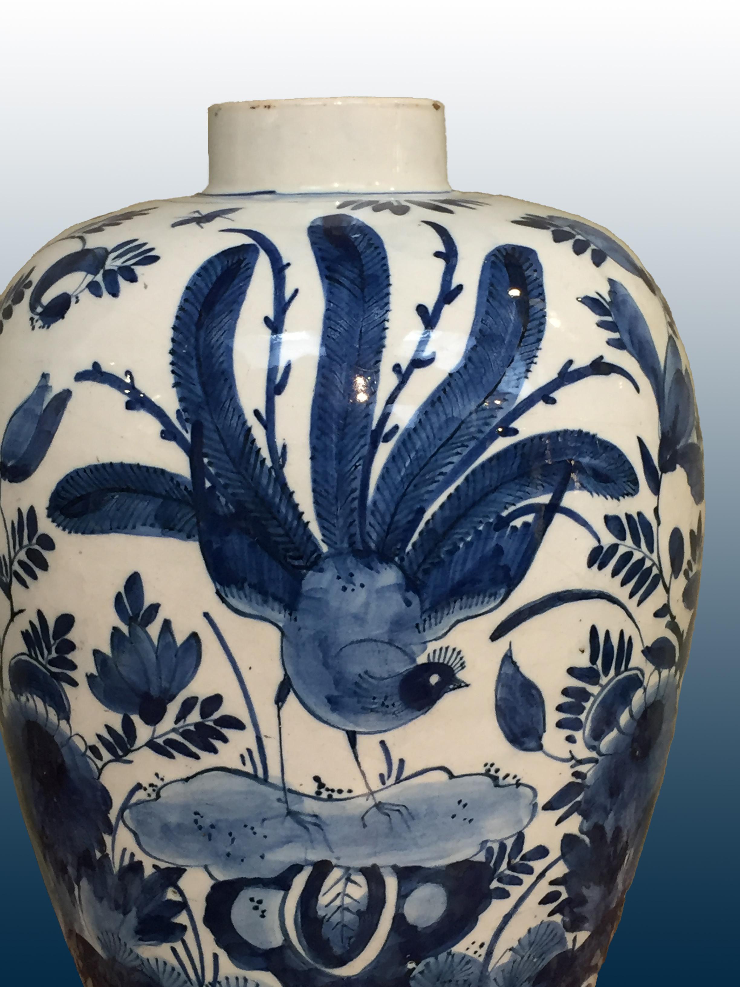 The Netherlands
Delft

First half of the 18th century
Workshop unknown

A blue and white jar with chinoiserie decoration in Kangxi style with a peacock in a garden. At the front, we see the peacock on a rock surrounded by flowers and insects, that