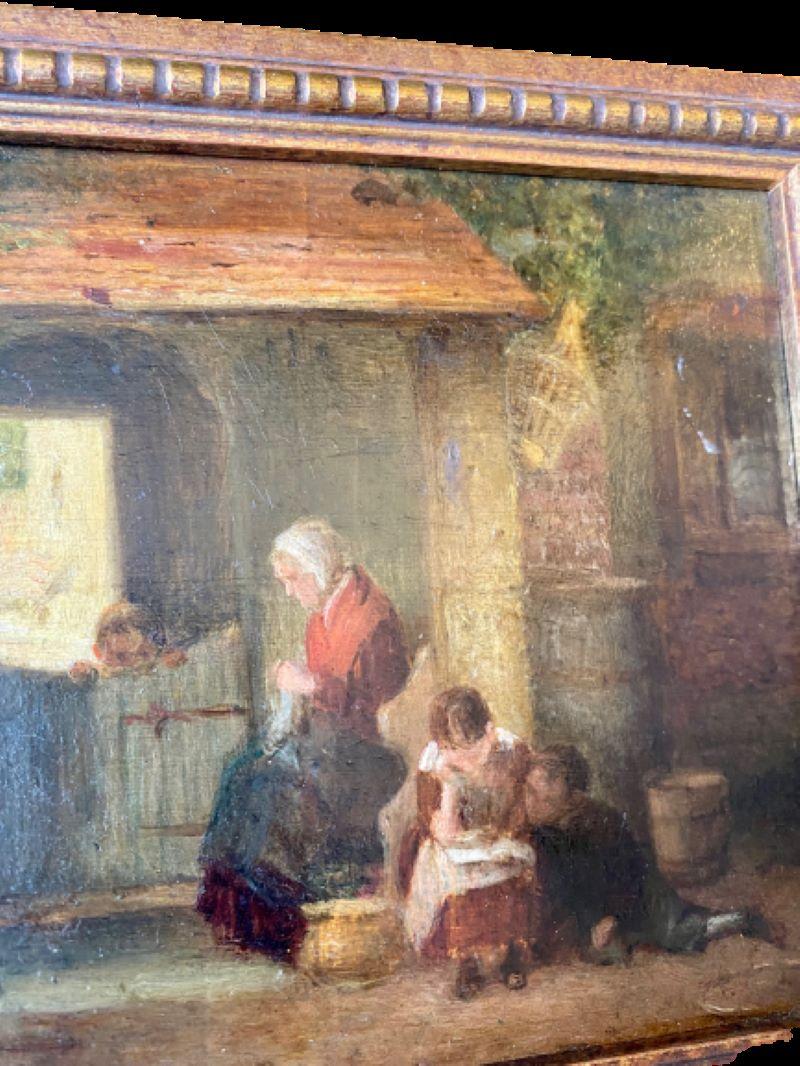 18th century Dutch Genre painting with mother and children, an oil on wooden panel miniature interior scene with mother sewing by light from window, two children seated beside her studying from a book, unsigned. The painting has the shadowy