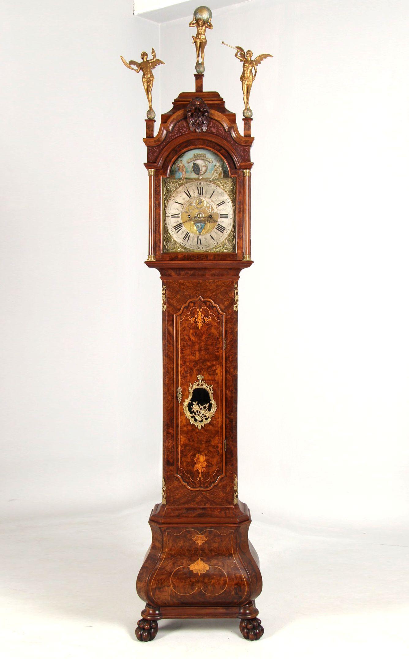 Antique Amsterdam grandfather clock with alarm, calendar and moon phase

Amsterdam
Walnut root and others
circa 1760

Dimensions:
H x W x D: 283 x 58 x 30 cm - without figures the height is reduced to 241 cm

Description:
Elaborate grandfather clock