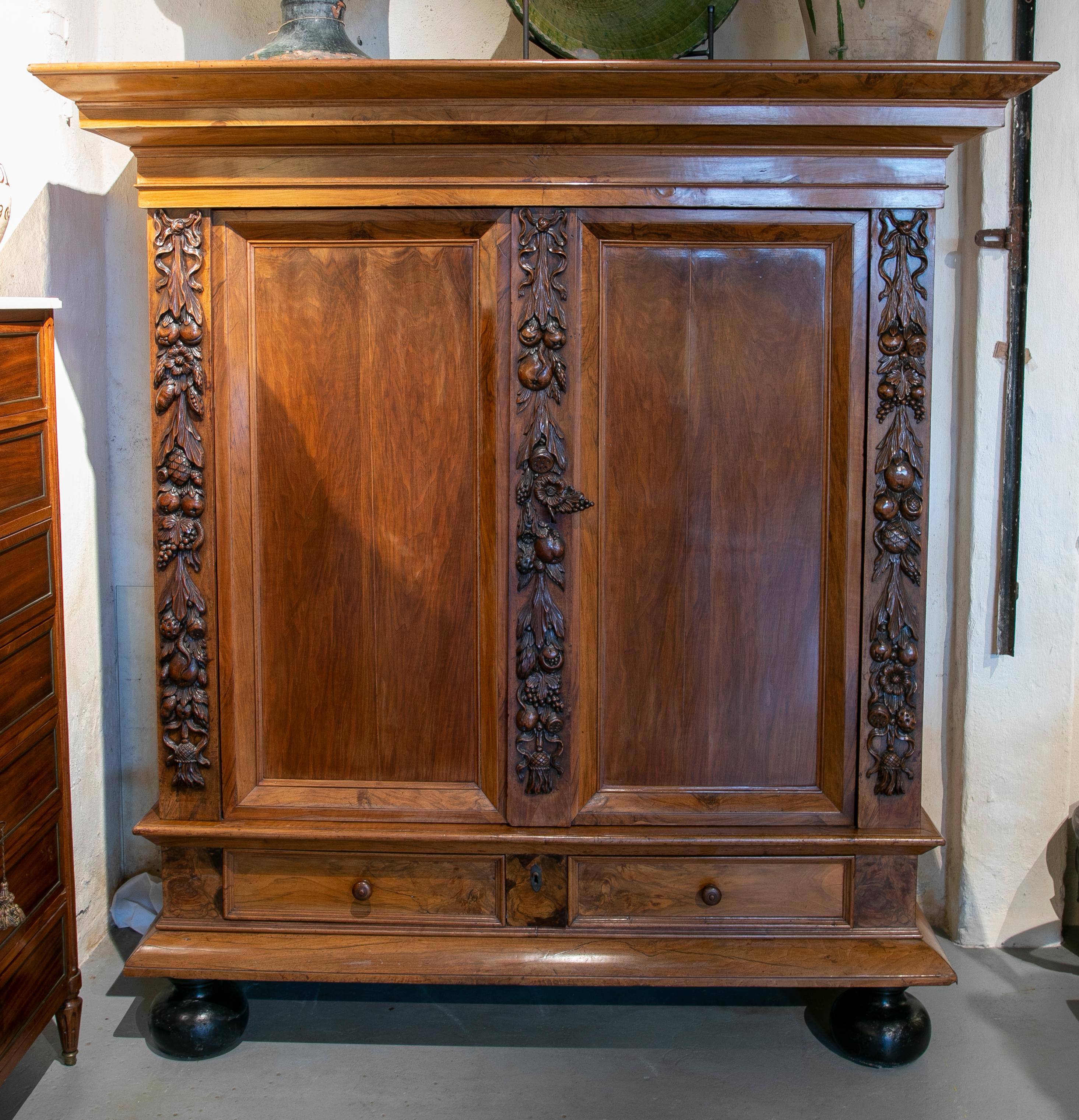 18th Century Dutch Hand-Carved walnut cupboard with fruit decoration.