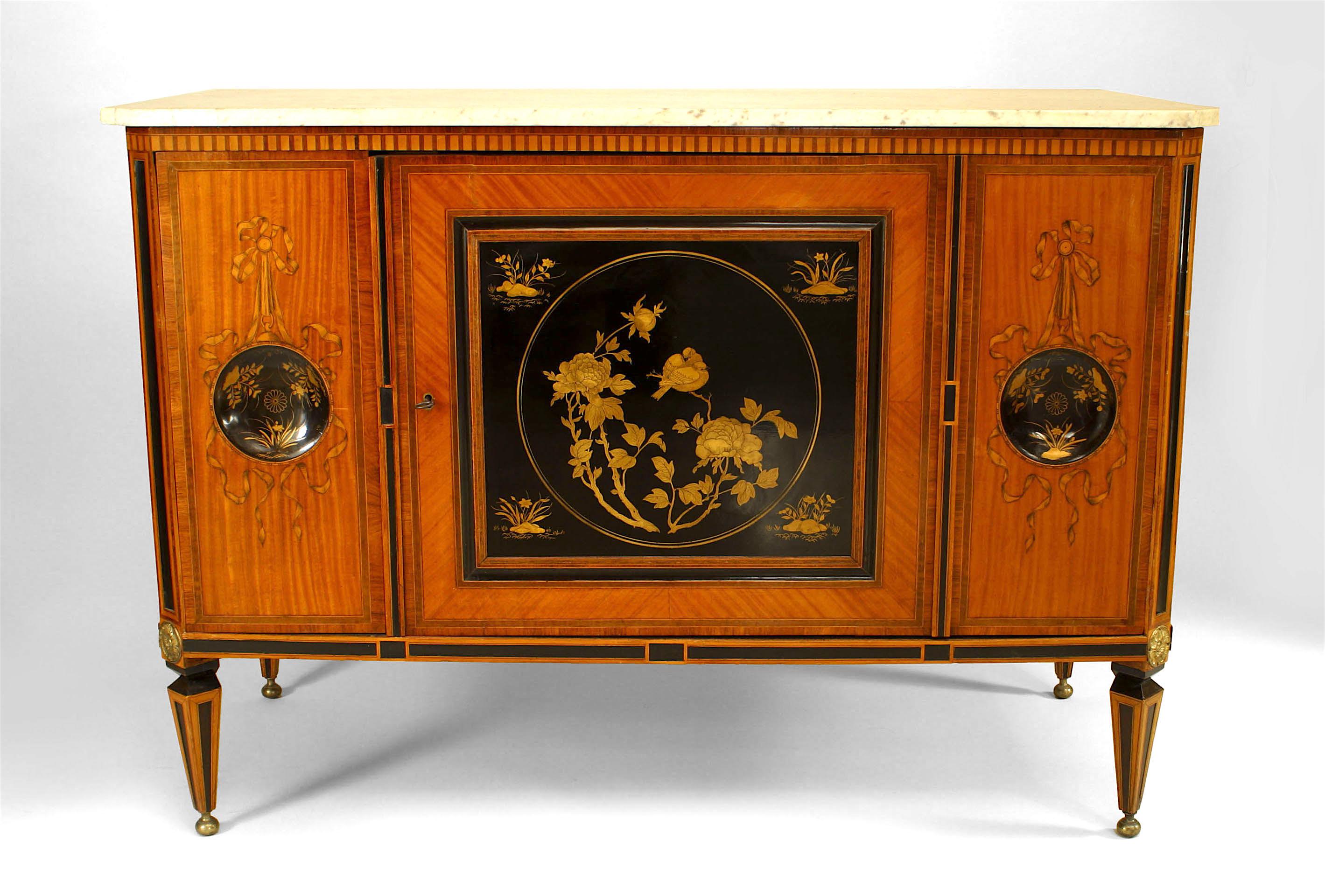 Late 18th century Dutch inlaid satinwood commode with two round decorated black lacquer panels centering a rectangular front panel, all raised upon four tapered, ball-footed legs.