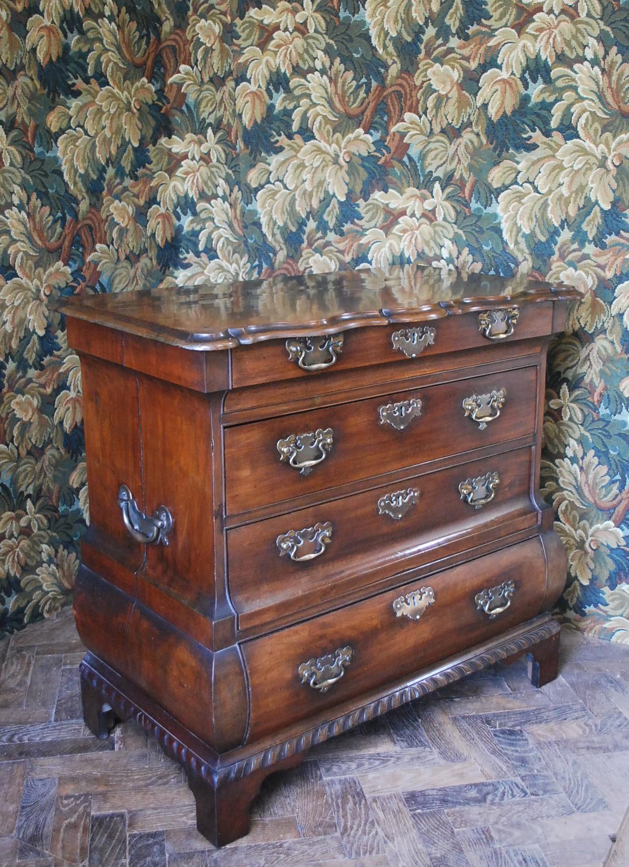 Hand-Carved 18th century Dutch mahogany bombe commode For Sale
