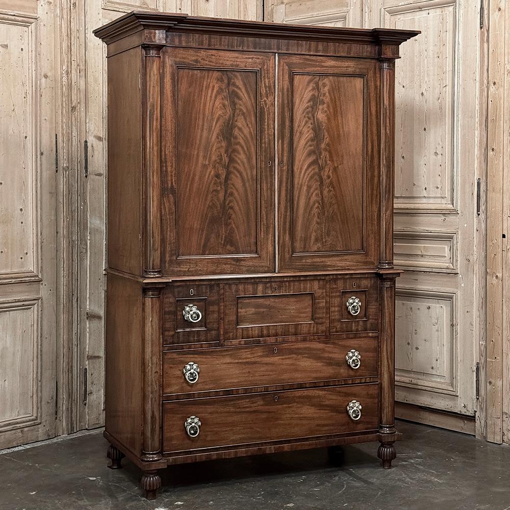 18th Century Dutch Mahogany Linen Press is a magnificent rendition in the classical style that was revitalized during the second half of the 1700s, as it has been for millennia!  Starting with the crown, which is an intricately fashioned molding