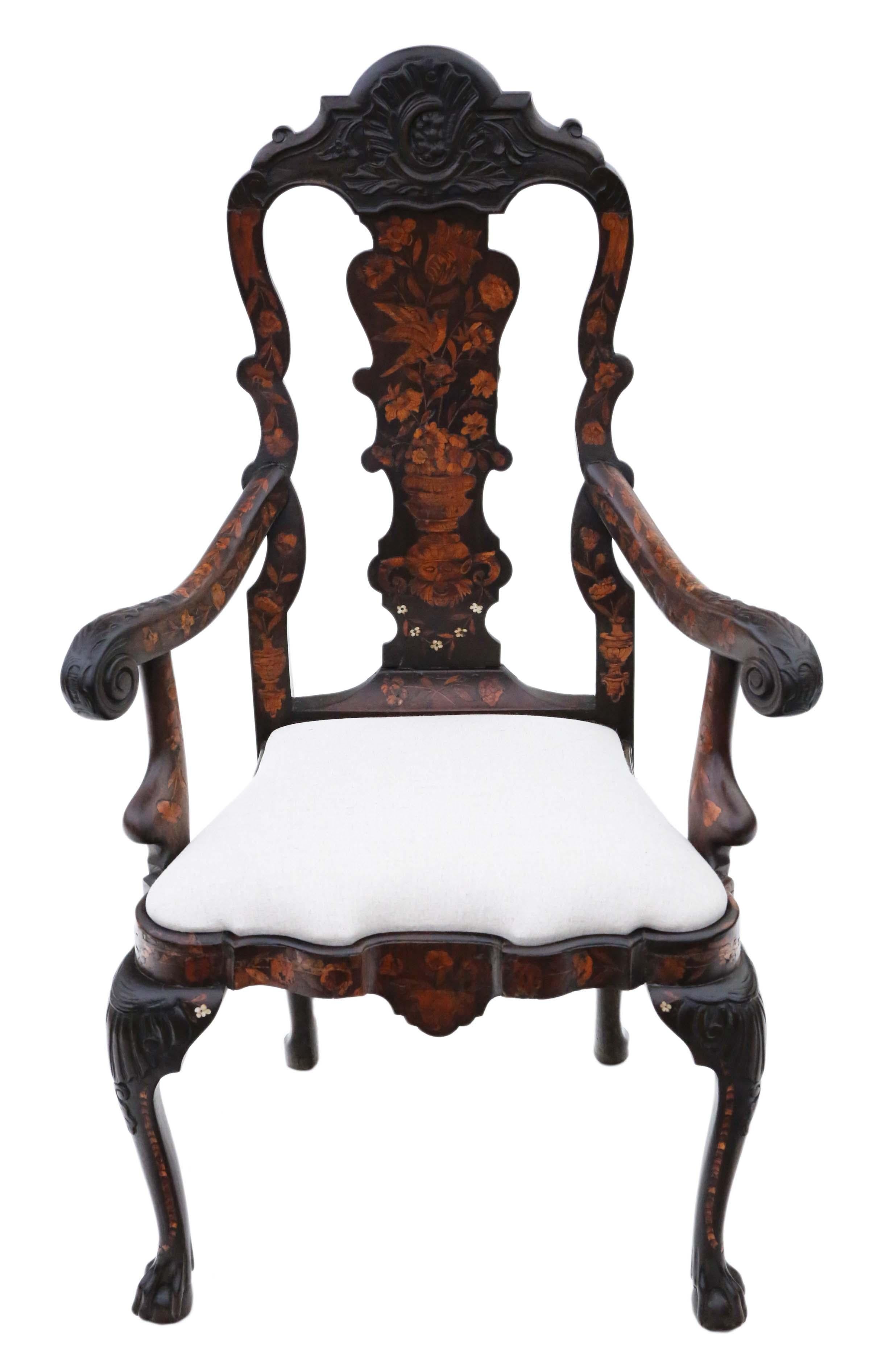 Experience the exquisite craftsmanship of this very fine quality 18th Century Dutch marquetry elbow arm or desk chair, a versatile piece that could also serve as a side, hall, or carver chair. This chair stands out for its exceptional marquetry and