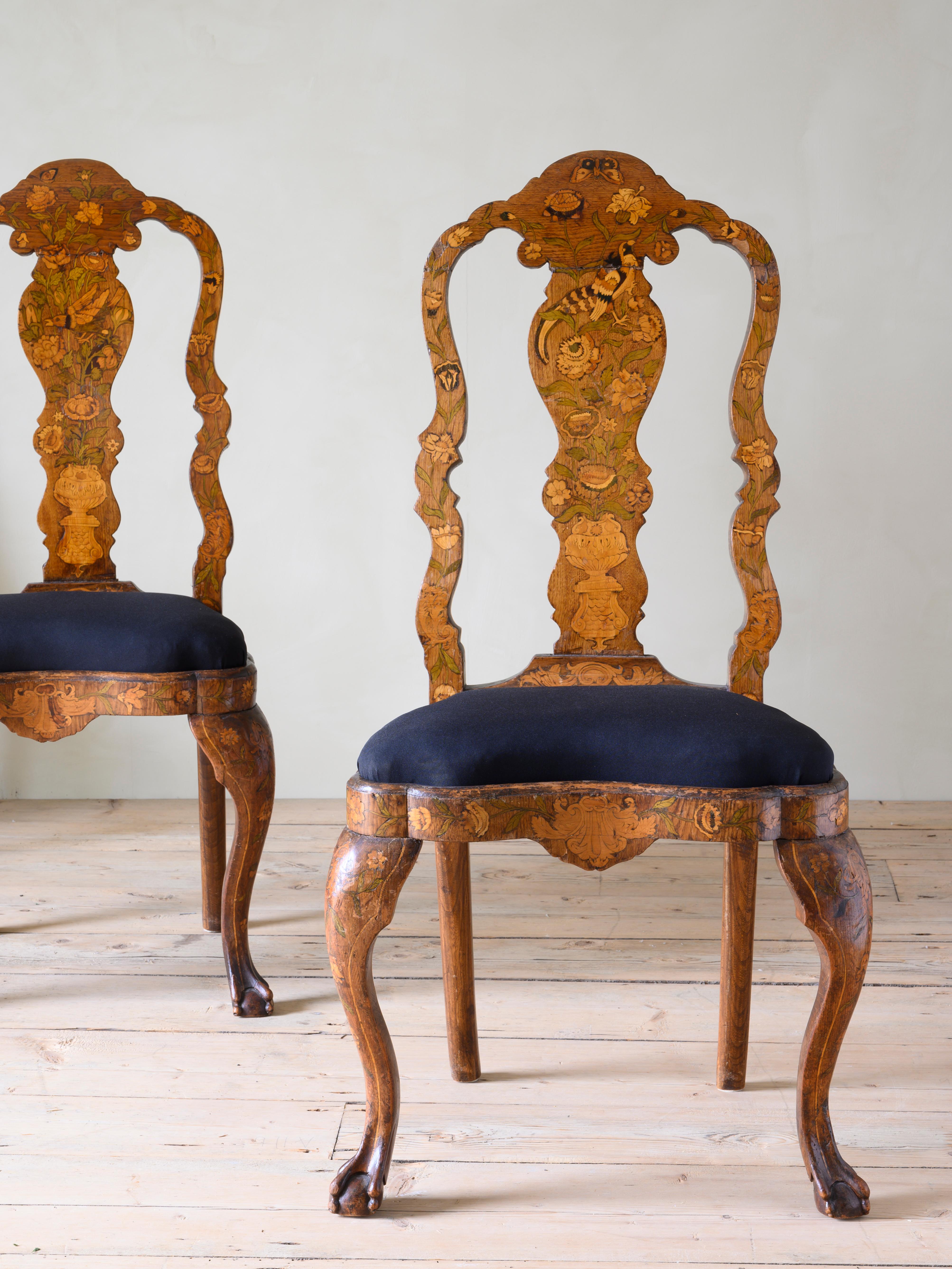 A fine set of four 18th century Dutch marquetry side chairs, circa 1780 Netherlands.

Good original condition with wear consistent with age and use. Structurally good and sturdy. A detailed condition report is available on request.