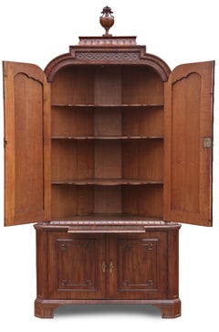 18th century Dutch oak and mahogany corner cabinet with gilded bronze fittings