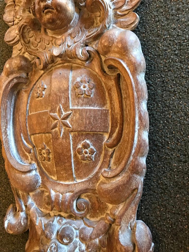 Hand-Carved 18th Century Dutch or Flemish Carved Oak Armorial Shield with Putto