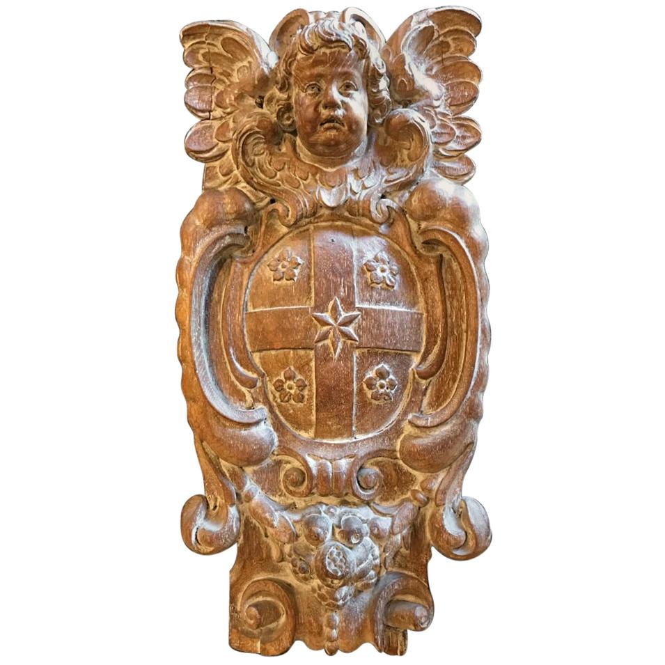 18th Century Dutch or Flemish Carved Oak Armorial Shield with Putto