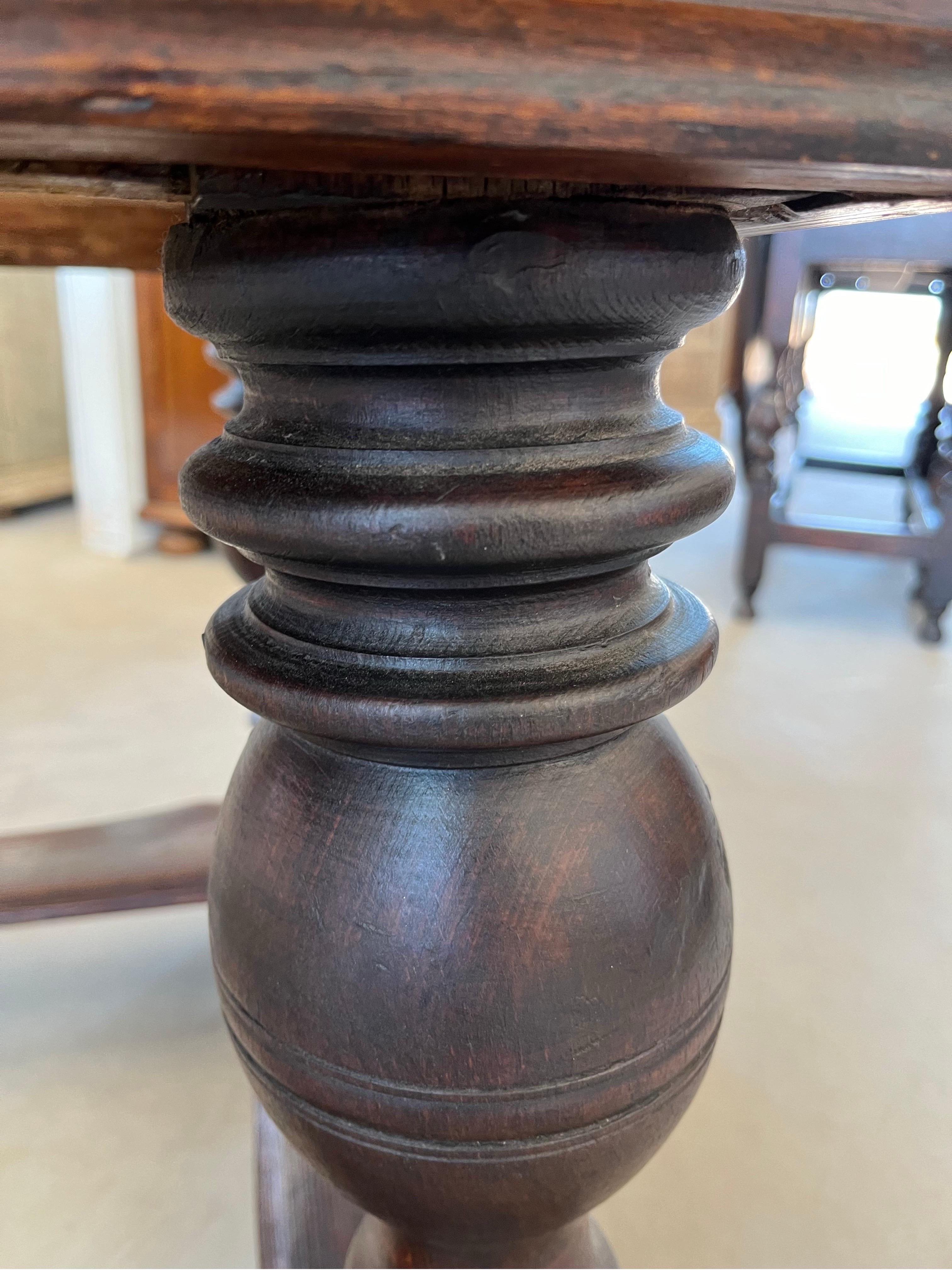 Side table hand-made in the Netherlands in the late 1700s using pine. The table has beautiful color and character, The top is made of three boards with straight edges ant its dovetailed to the apron. On the front the table shows an inset large