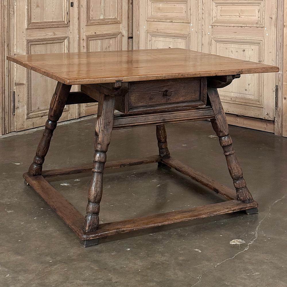 18th Century Dutch Table was designed for daily use, and can literally serve in dozens of capacities in virtually any room of the home or office!  Hand-crafted from select old-growth oak, it features a solid plank top that is almost square, with