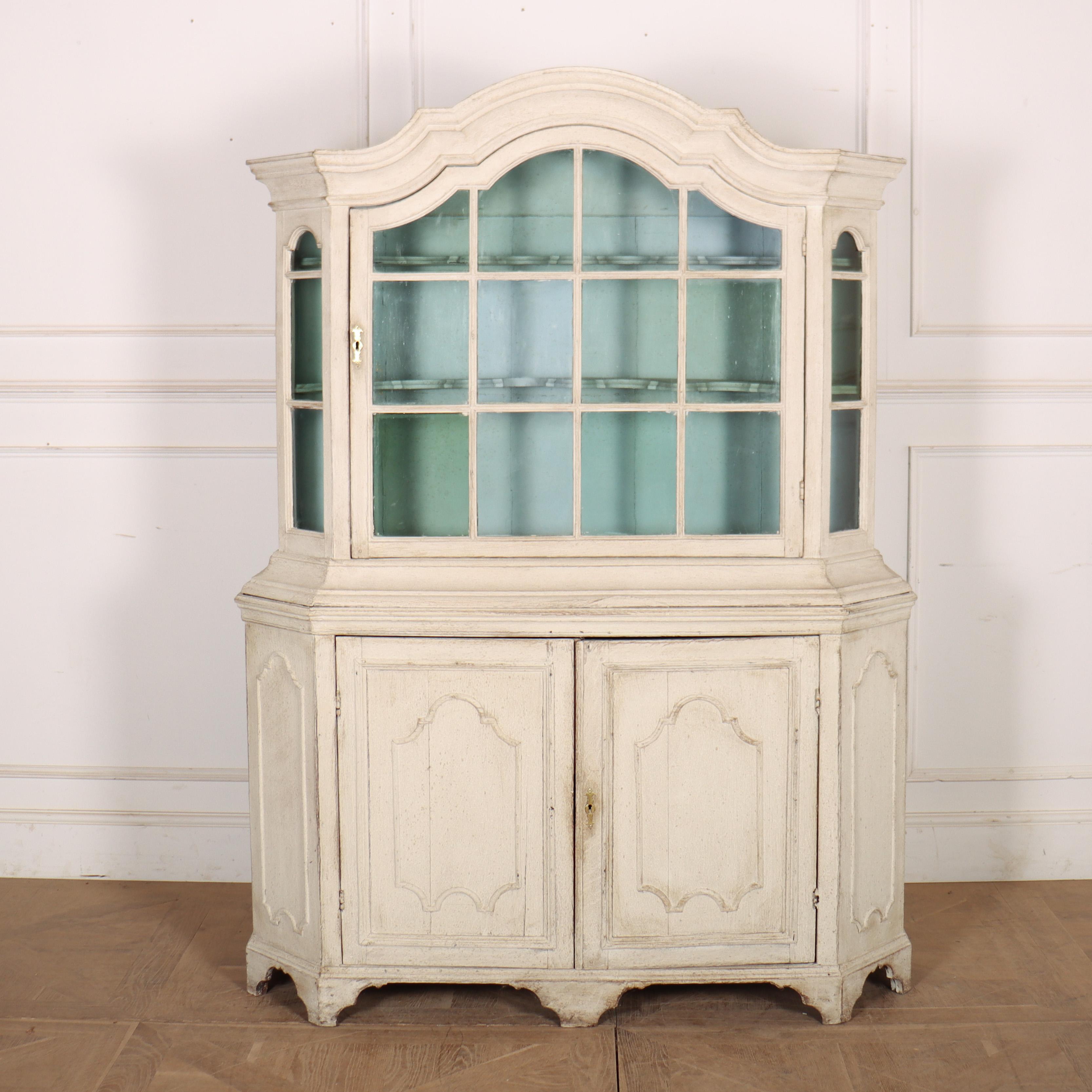 Lovely small 18th Century Dutch painted vitrine with stunning hand blown glass. Painted in an old white and blue interior. 1770
