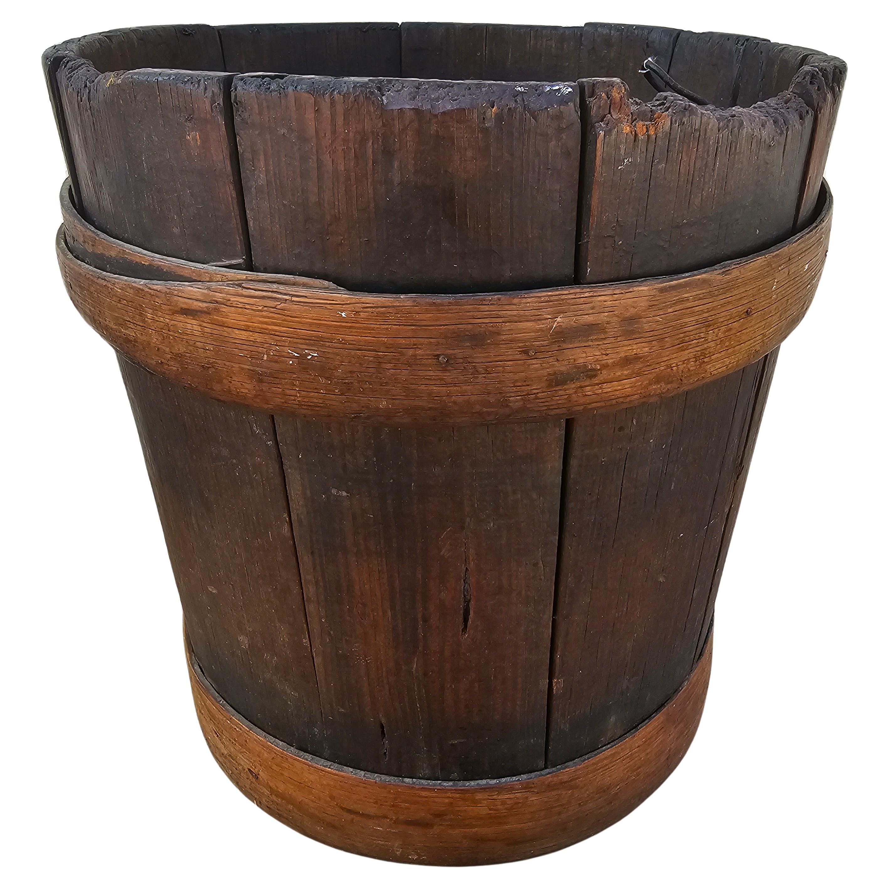 A charming 18th Century Elm Primitivist Kindling or Fire Bucket measuring 12
