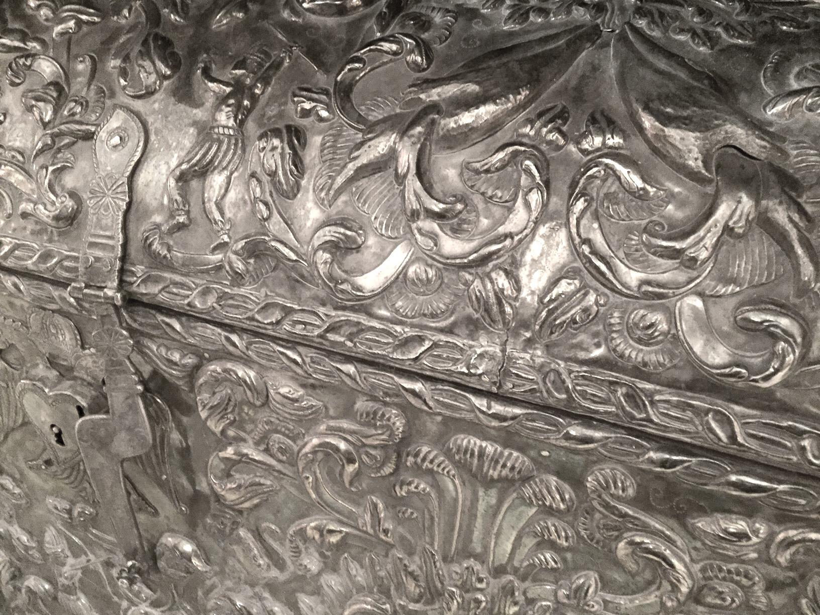 A magnificent embossed solid silver coffer of palatial scale in the baroque taste, decorated with Indian hunters, parrots, monkeys, squirrels, pomegranates and foliage. The domed top bearing the inscription ‘Soy De Mi Amo y Senor Jose De La Vega’ in