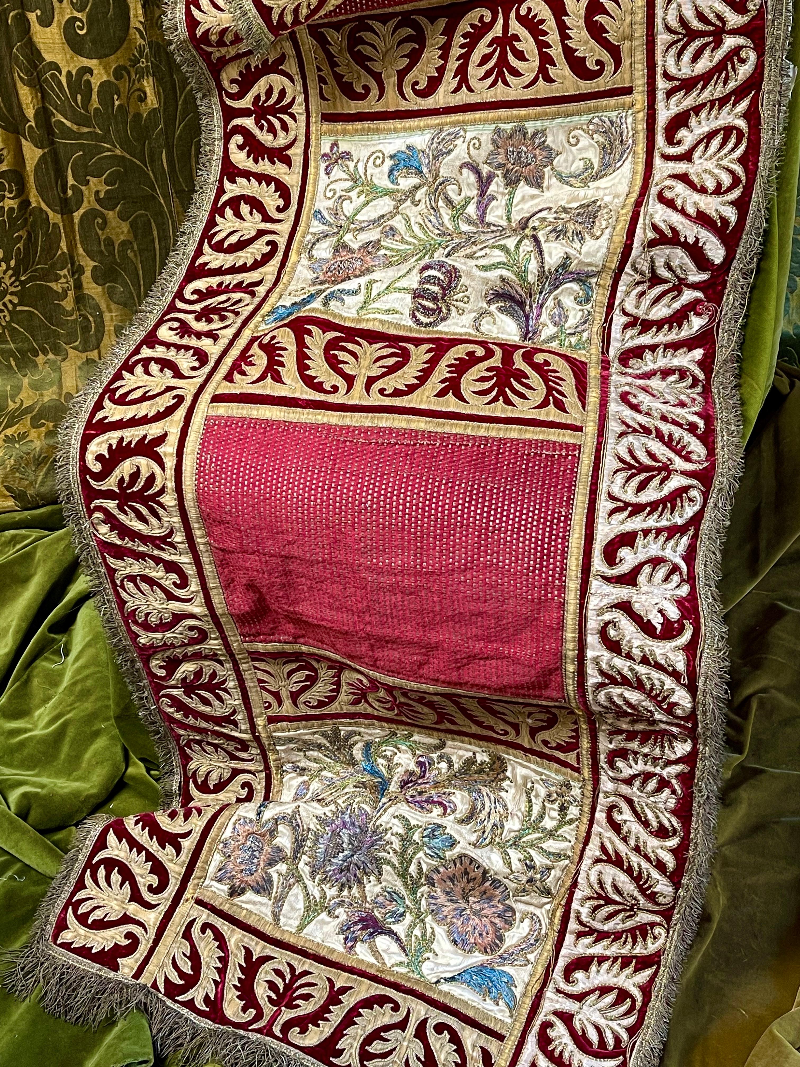 Impressive Antique Embroidered Panel

Dating from 18th Century

Three beautifully hand embroidered silk floral panels , Three hand woven burgundy silk and gold metallic threads panels . All within velvet and gold silver thread borders .  Edged with