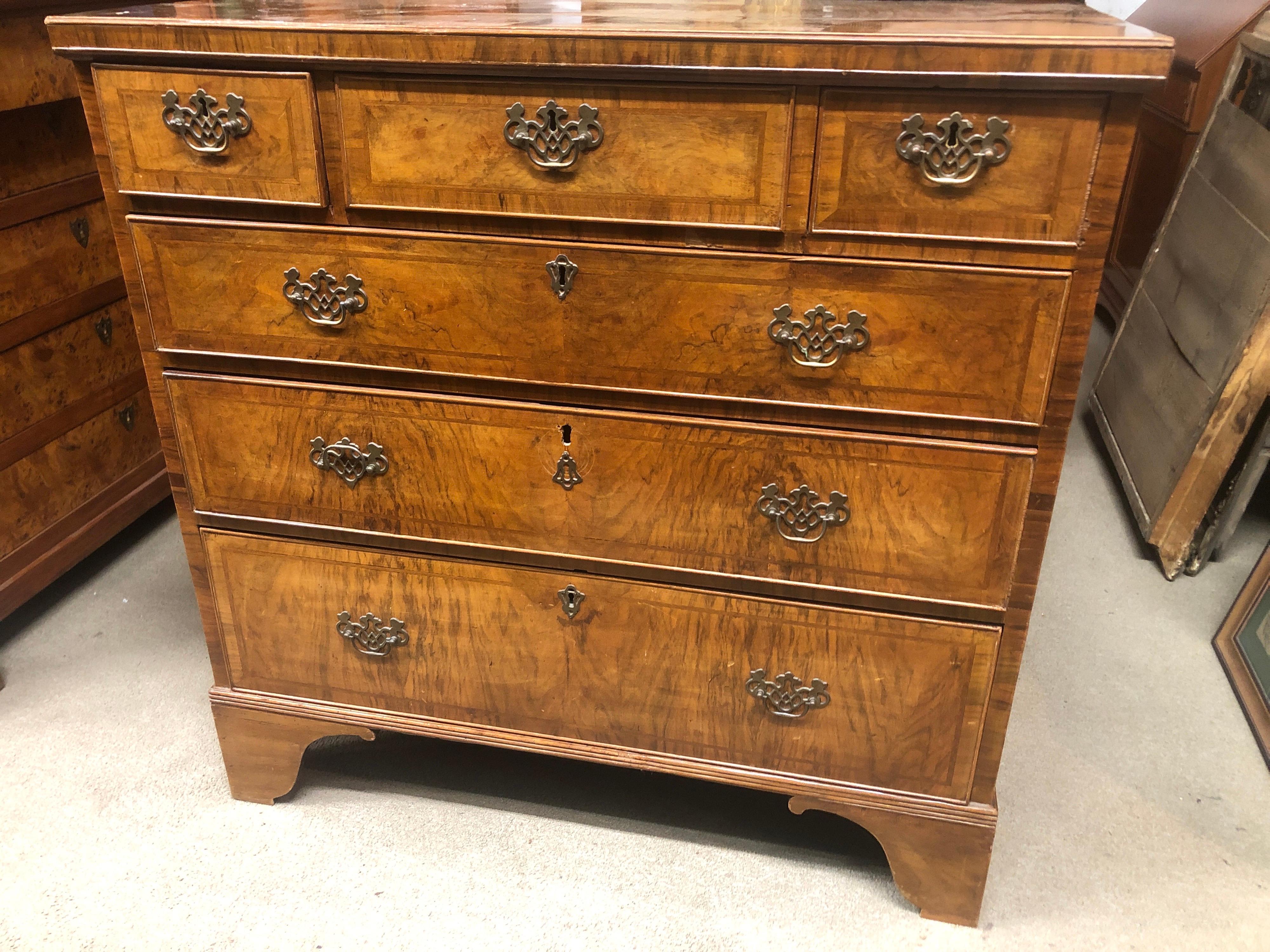Queen Anne style dressers, of excellent workmanship and proportions, furniture of well-off family origin and commission, were made by good cabinetmakers in high skill workshops. In fine walnut wood and brass applications, as usual on this style of