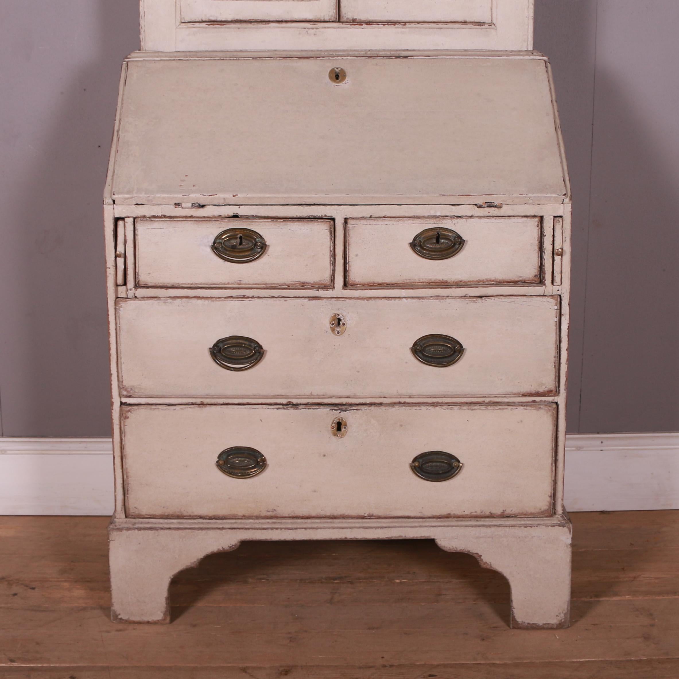 Very small late 18th C English painted oak bureau bookcase. 1780.

Reference: 7382

Dimensions
34 inches (86 cms) Wide
19.5 inches (50 cms) Deep
82 inches (208 cms) High.