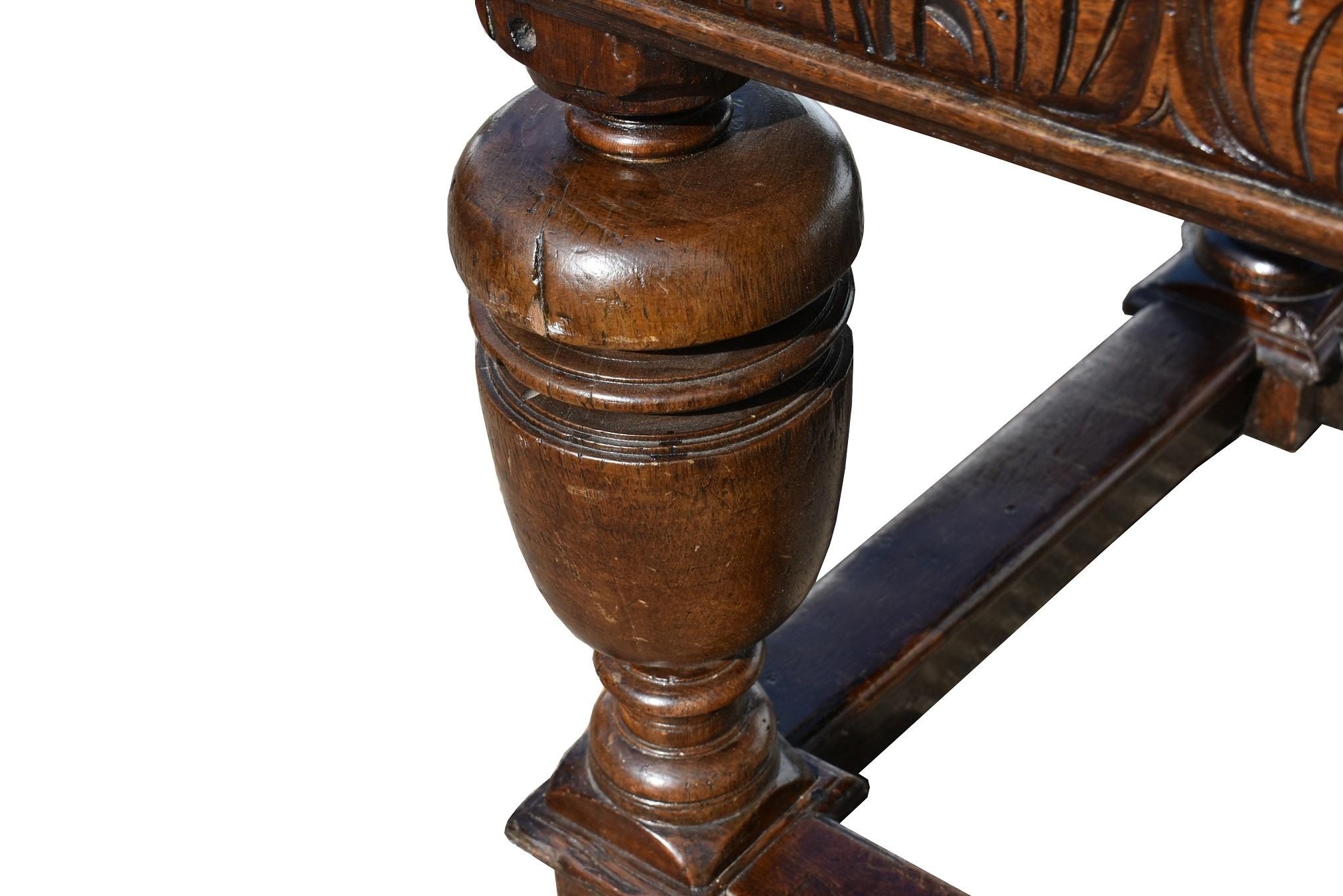 For sale is a good quality 18th century solid oak draw leaf refectory table. Having a carved frieze, above bulbous turned legs, united by a stretcher. The table has two draw leaves making the maximum length 426cm. The table will comfortably sit