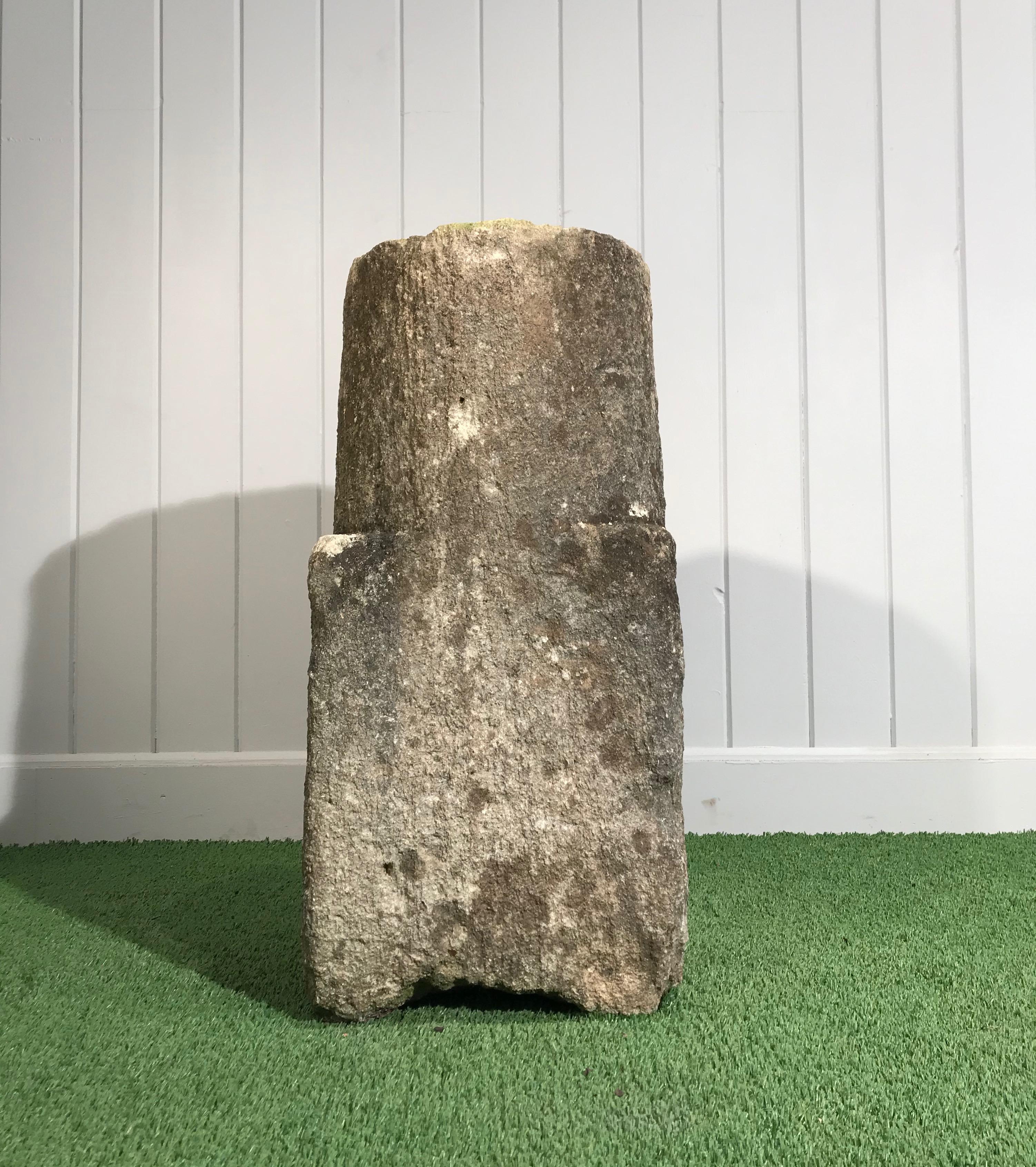 This early and beautifully-patinated carved stone piece was originally a roadside marker, but, sometime in the past, was cut down a bit so that the top can now accept a piece of sculpture or urn. It would make a wonderful centerpiece in a small