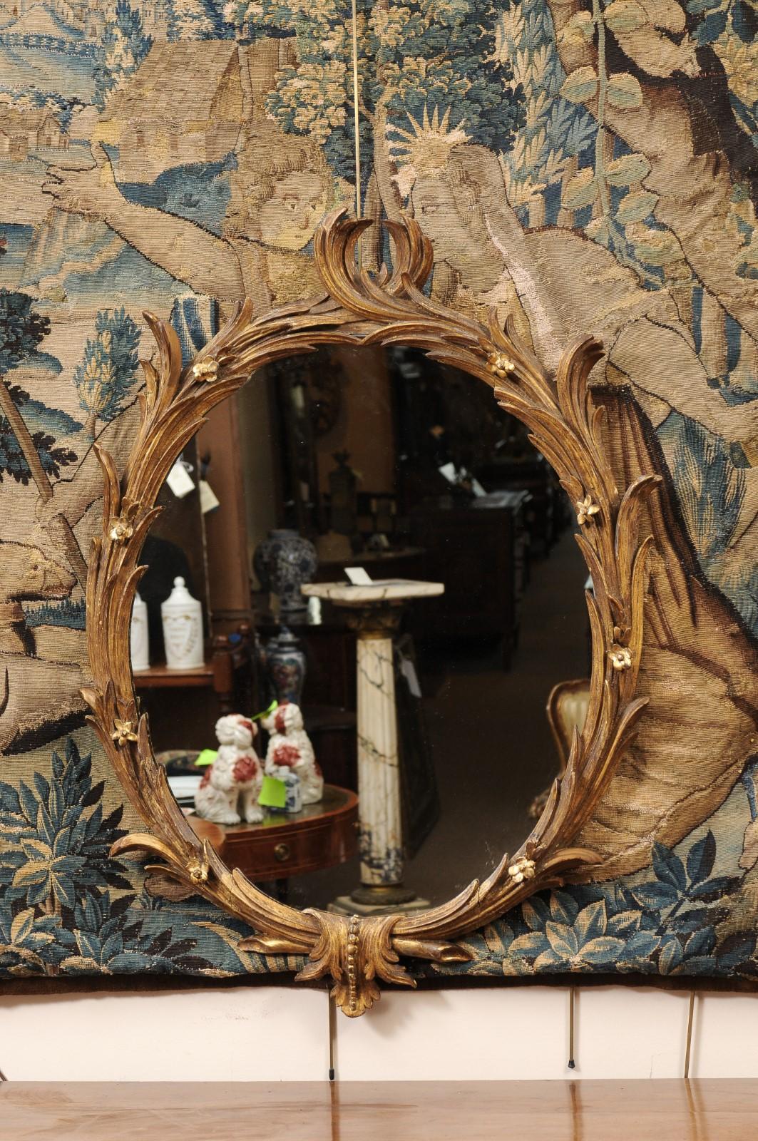 18th Century and Earlier 18th Century English Chippendale Oval Giltwood Mirror with foliage design