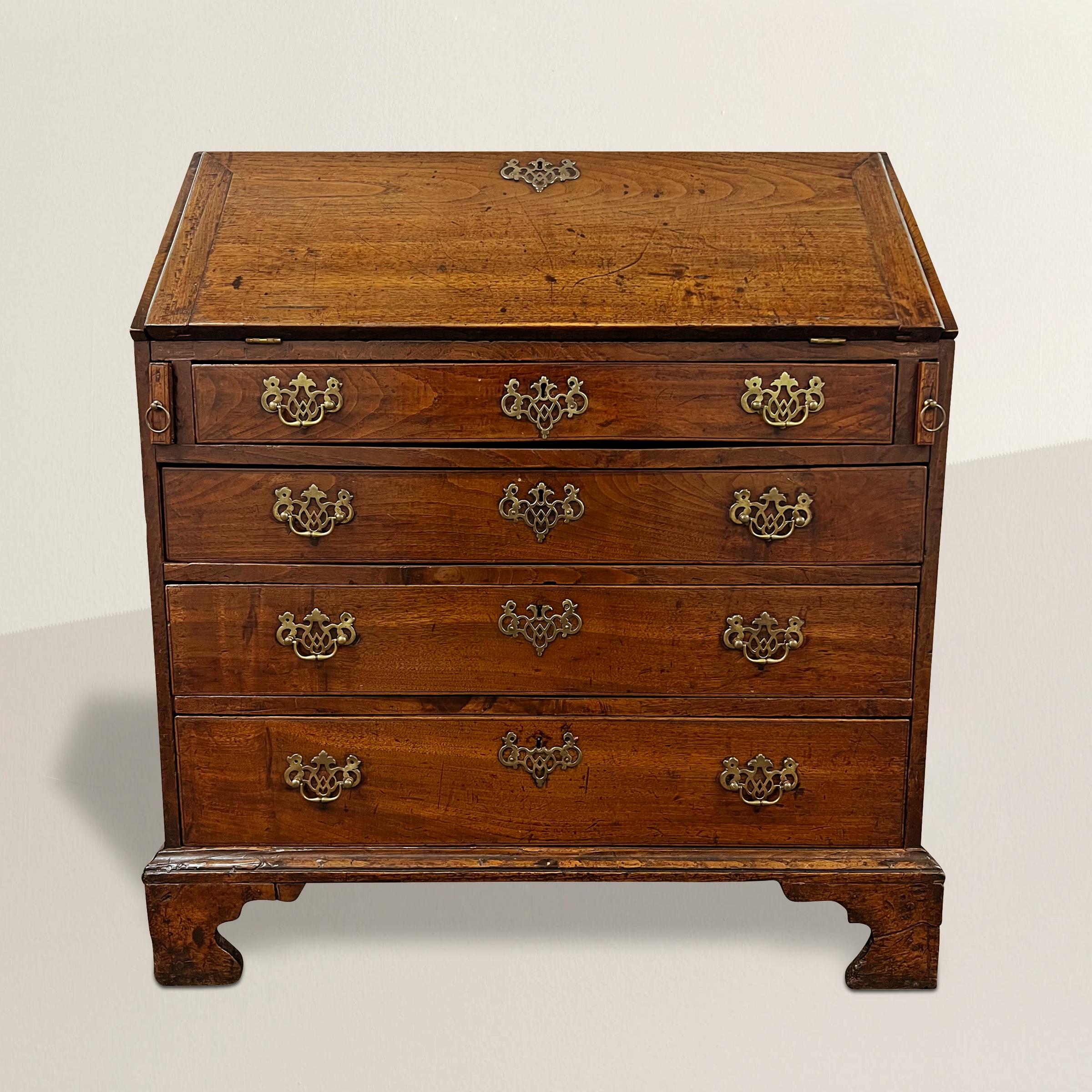 Step into the grace and sophistication of the 18th century with our exquisite English oak secretaire, an embodiment of Georgian Chippendale-style craftsmanship. Elegantly merging form and function, this slant-front beauty features four drawers