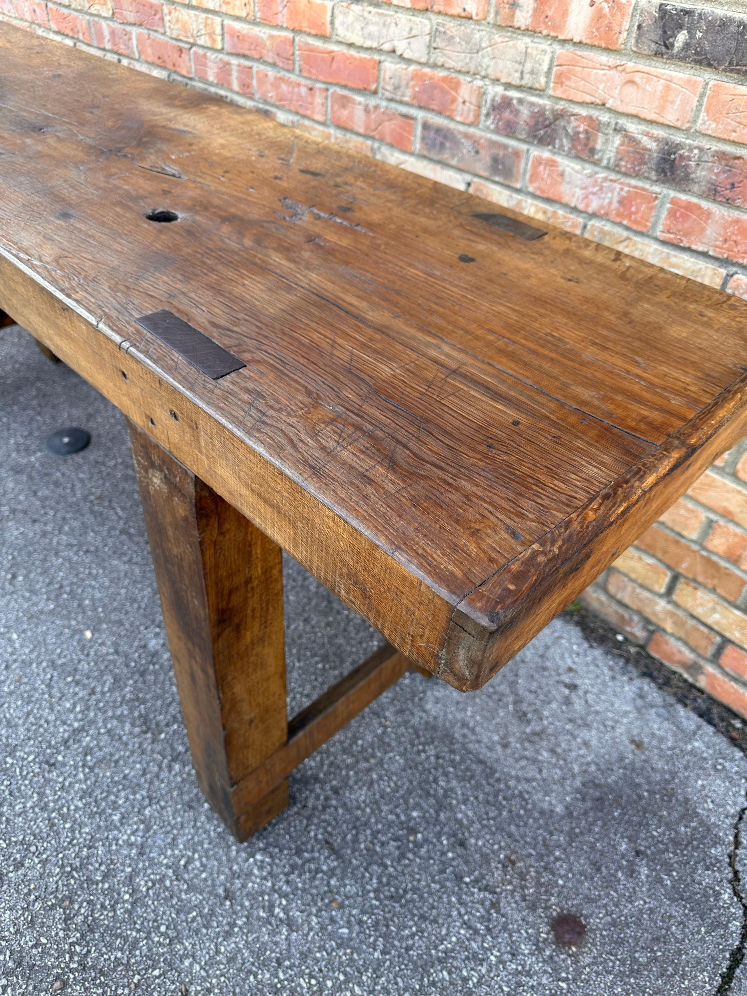 This is a 18th century English carpenters work bench. We've cleaned and waxed which high lights the character and age and patina is absolutly amazing. I like to reference this as an elegant rustic rather than just rustic, it could easily go in an