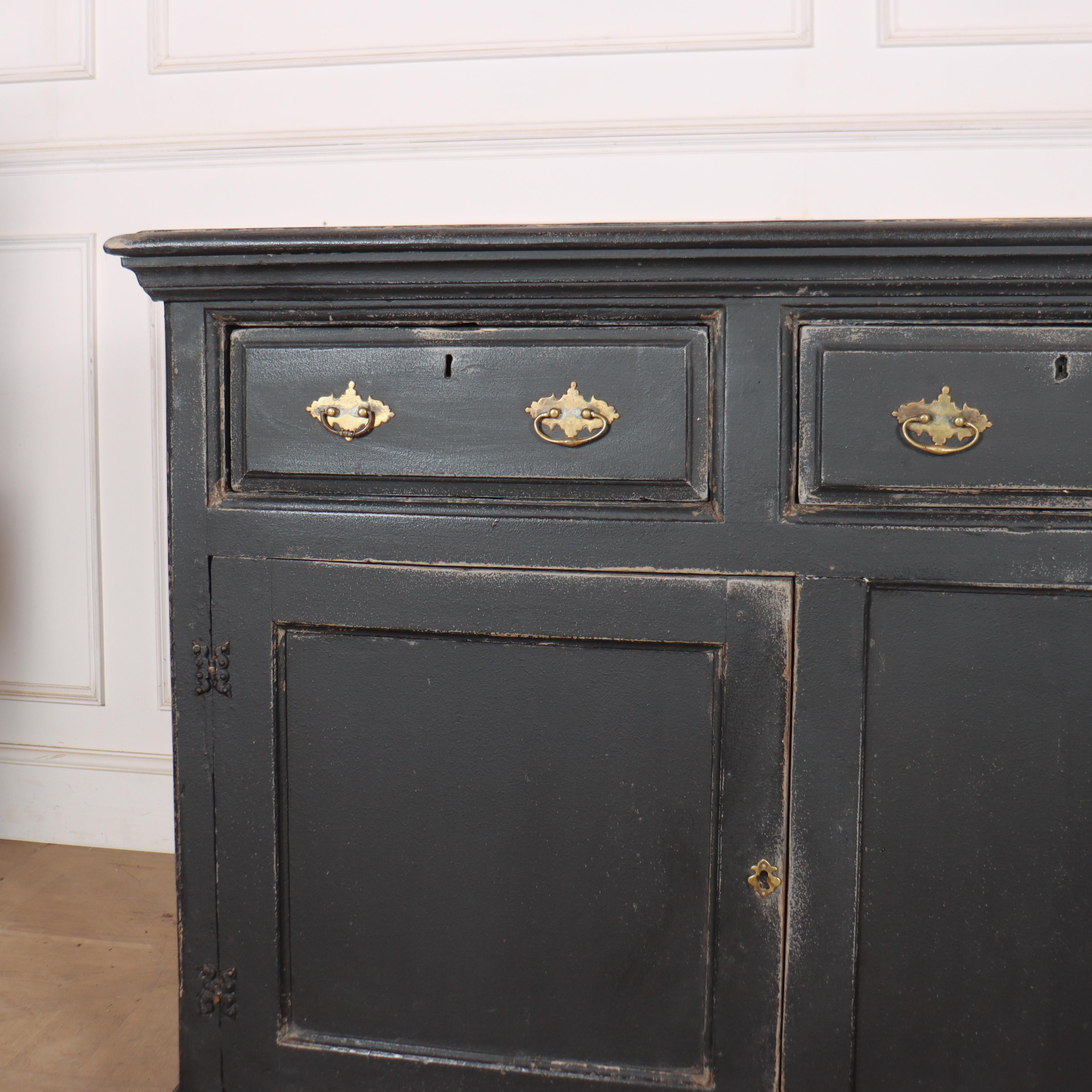 Small painted 18th century English country dresser base with a combination of pine and oak. 1760.

Code: 8768

Dimensions:
W: 66