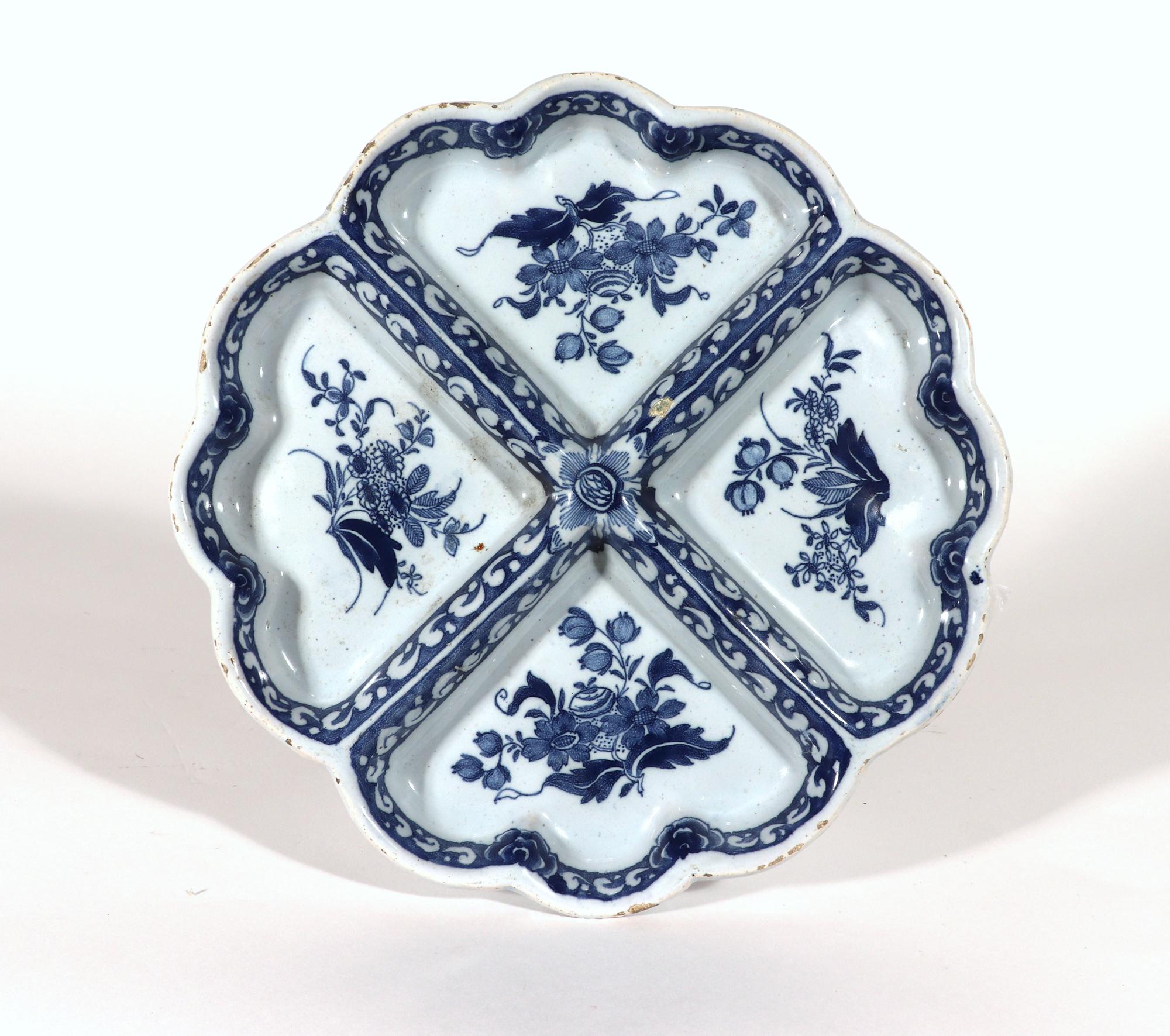 English Delftware blue & white sweetmeat dish,
London,
Possibly Lambeth High Street, William Griffith's pottery.
Circa 1750-60

The rare underglaze blue & white sweetmeat dish is divided into four sections with two different patterns of leaves