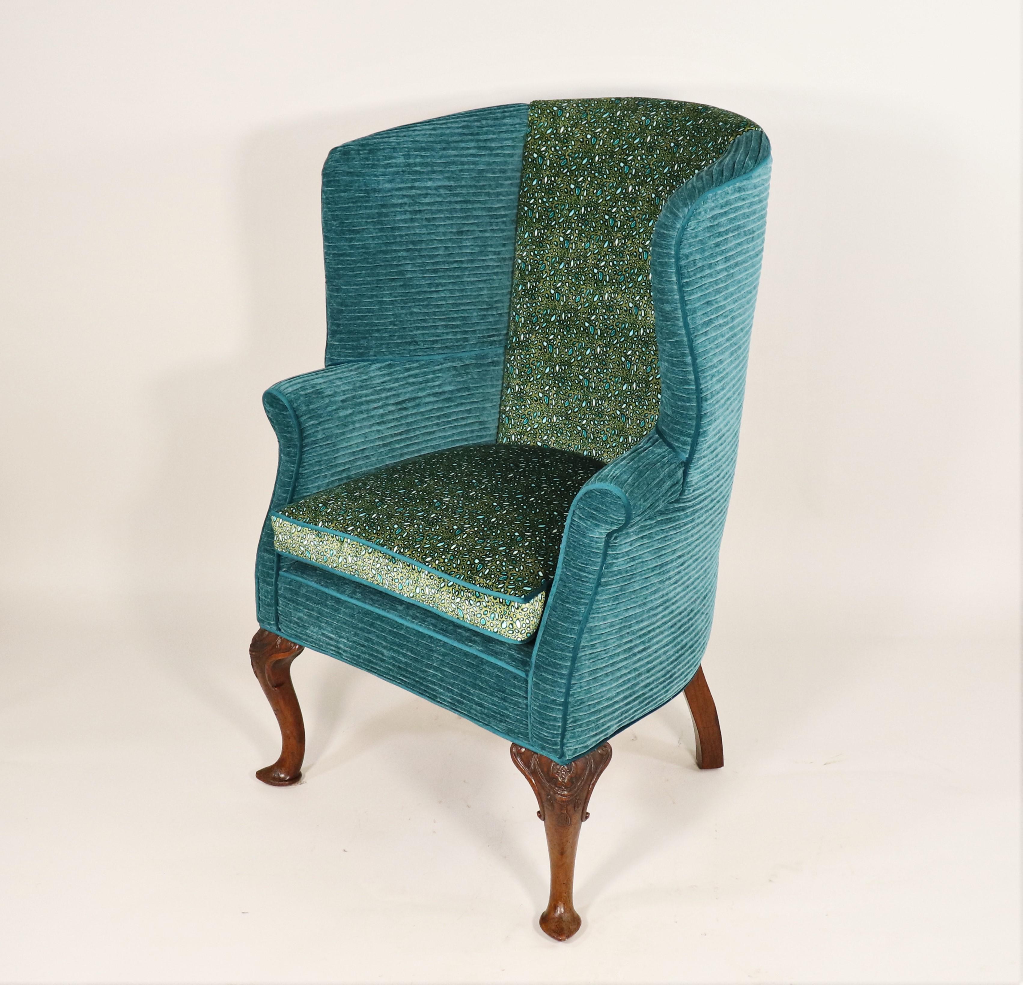 This is an excellent 18th-century English Chippendale-style wingback chair. The wingback armchair was designed to be sat in front of a fireplace. The unique ‘wings’ prevented drafts of wind from slicing through while also trapping the heat from the