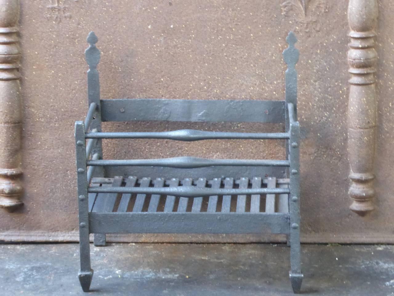 18th century English Georgian fireplace grate made of wrought iron and cast iron.

We have a unique and specialized collection of antique and used fireplace accessories consisting of more than 1000 listings at 1stdibs. Amongst others, we always have