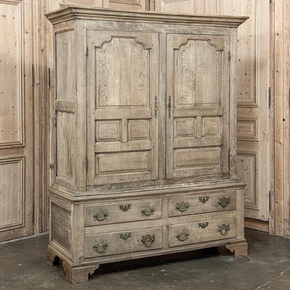 18th Century English Linen Press ~ Cabinet in Stripped Oak was designed to be the ultimate storage piece for an affluent family!  Two large cabinet doors with four panels each provide access to four surfaces within for just about anything you need