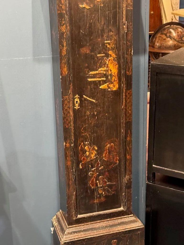 Discover the charm of a 18th century English Longcase Clock, featuring a brass face plate crafted by the renowned John Parsons. This timepiece also features a chinoiserie design. Each detail of this clock reflects the artisan's dedication to quality
