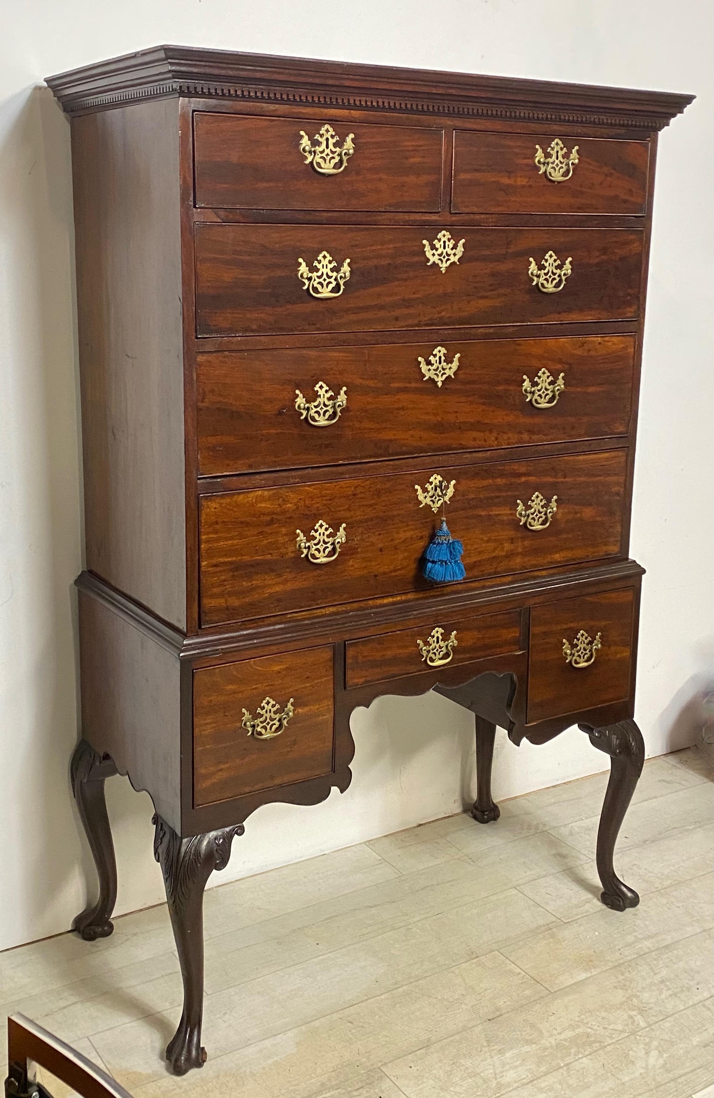 A late 18th century English Chippendale style mahogany chest on stand.
In remarkable antique condition, excellent quality, and having an unusual Spanish foot detail.
England, circa 1790.