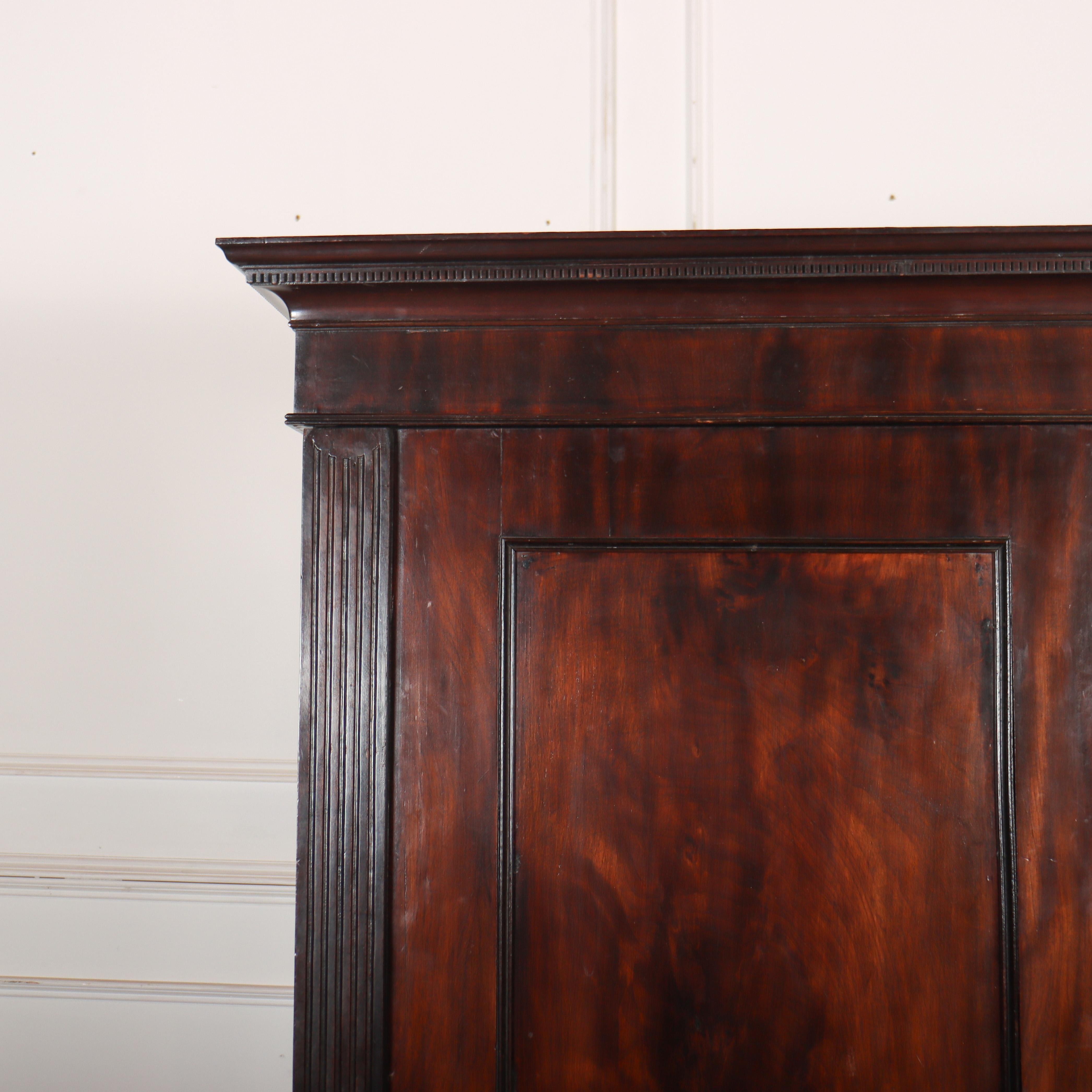 Super quality late 18th C English mahogany wardrobe with a fitted interior and good quality timber. 1795.

Reference: 8380

Dimensions
59 inches (150 cms) Wide
23 inches (58 cms) Deep
71.5 inches (182 cms) High