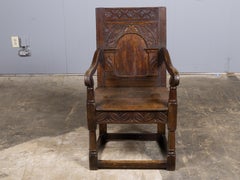 18th Century English Oak Armchair with Carved Back Panel