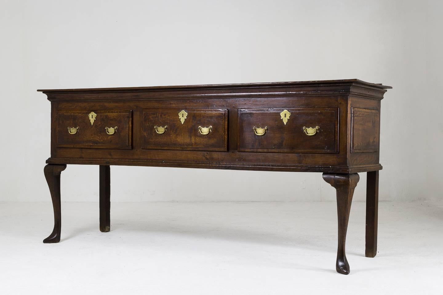 18th century English Oak dresser base, good color and proportions. Fitting nicely into a contemporary interior.